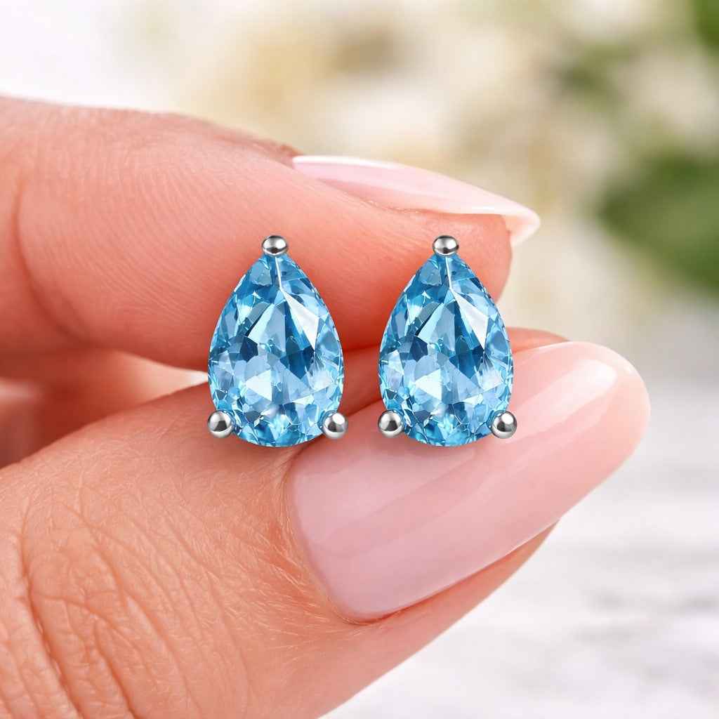 Natural Blue Topaz 3x5mm Pear Stud Earrings in 925 Sterling Silver