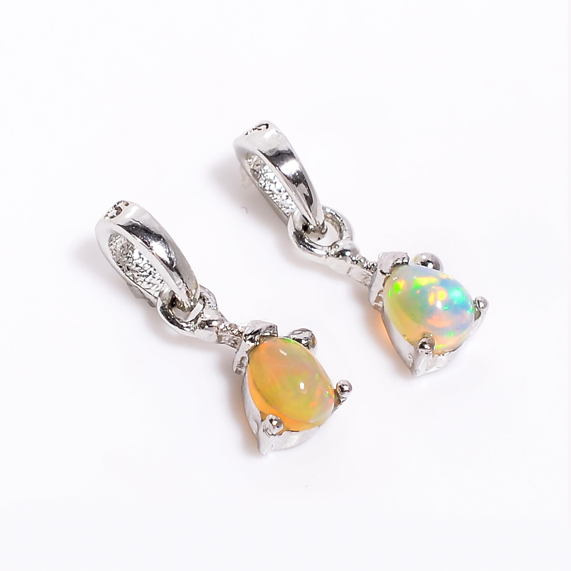 Himalya Quartz opal pear pendant necklace in 925 sterling silver featuring a vibrant October birthstone cabochon.