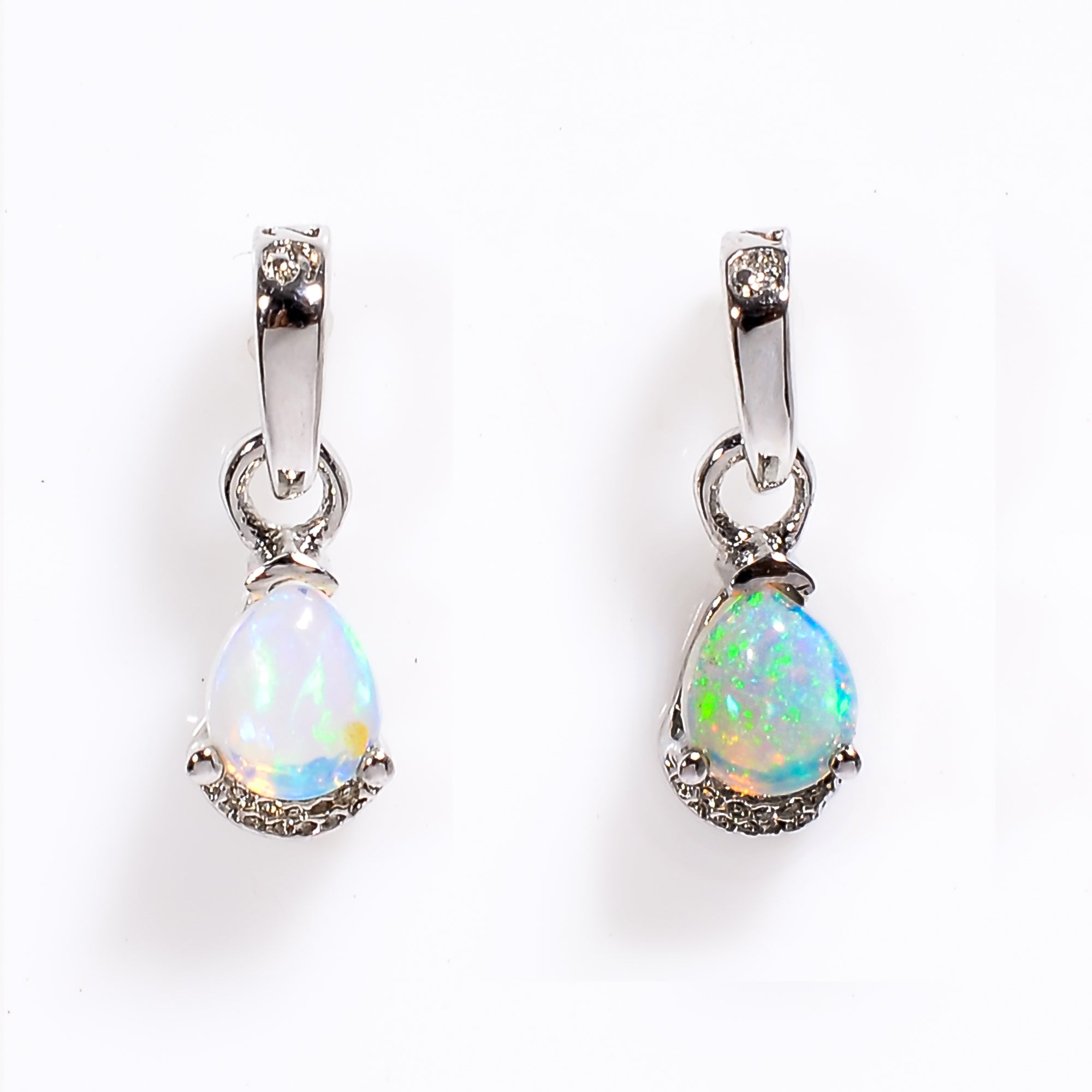 Natural opal pear pendant necklace in sterling silver by Himalya Quartz, showcasing minimalist design and vibrant opal gemstone.
