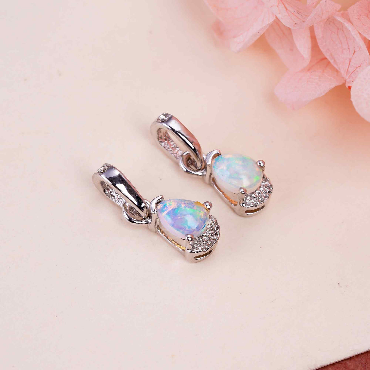 Natural opal pear pendant on a 925 sterling silver chain, minimalist design, from Himalya Quartz, ideal for elegant jewelry gifting.