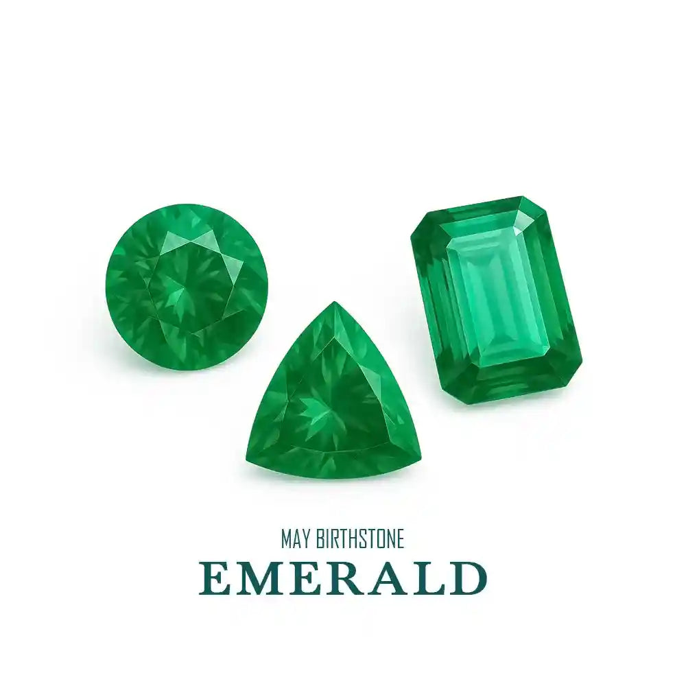 Three green emeralds of different shapes on a white background with 'May Birthstone Emerald' text.