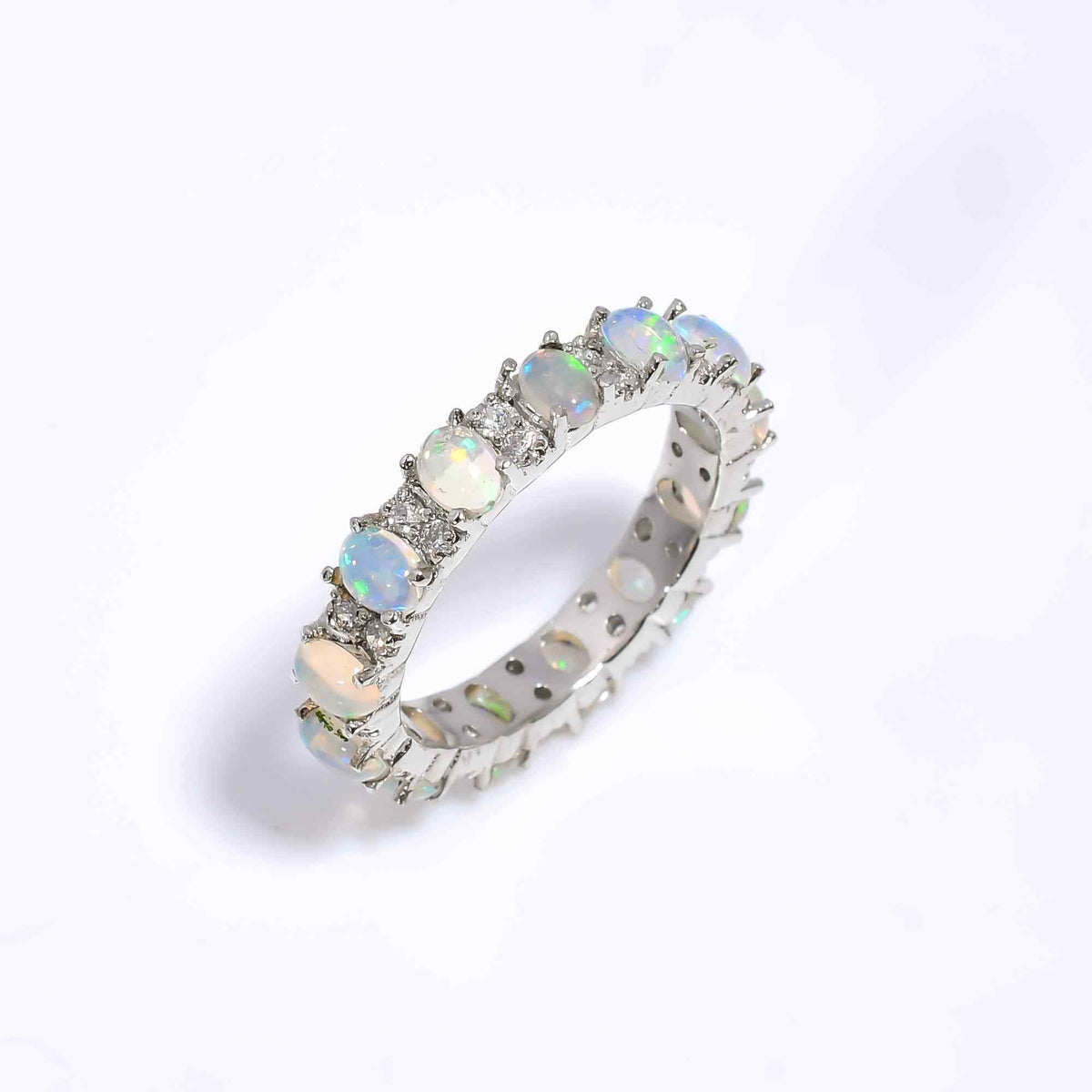 Ethiopian Opal Cluster Ring with 3x4mm oval opals in sterling silver, handmade jewelry by Himalya Quartz.