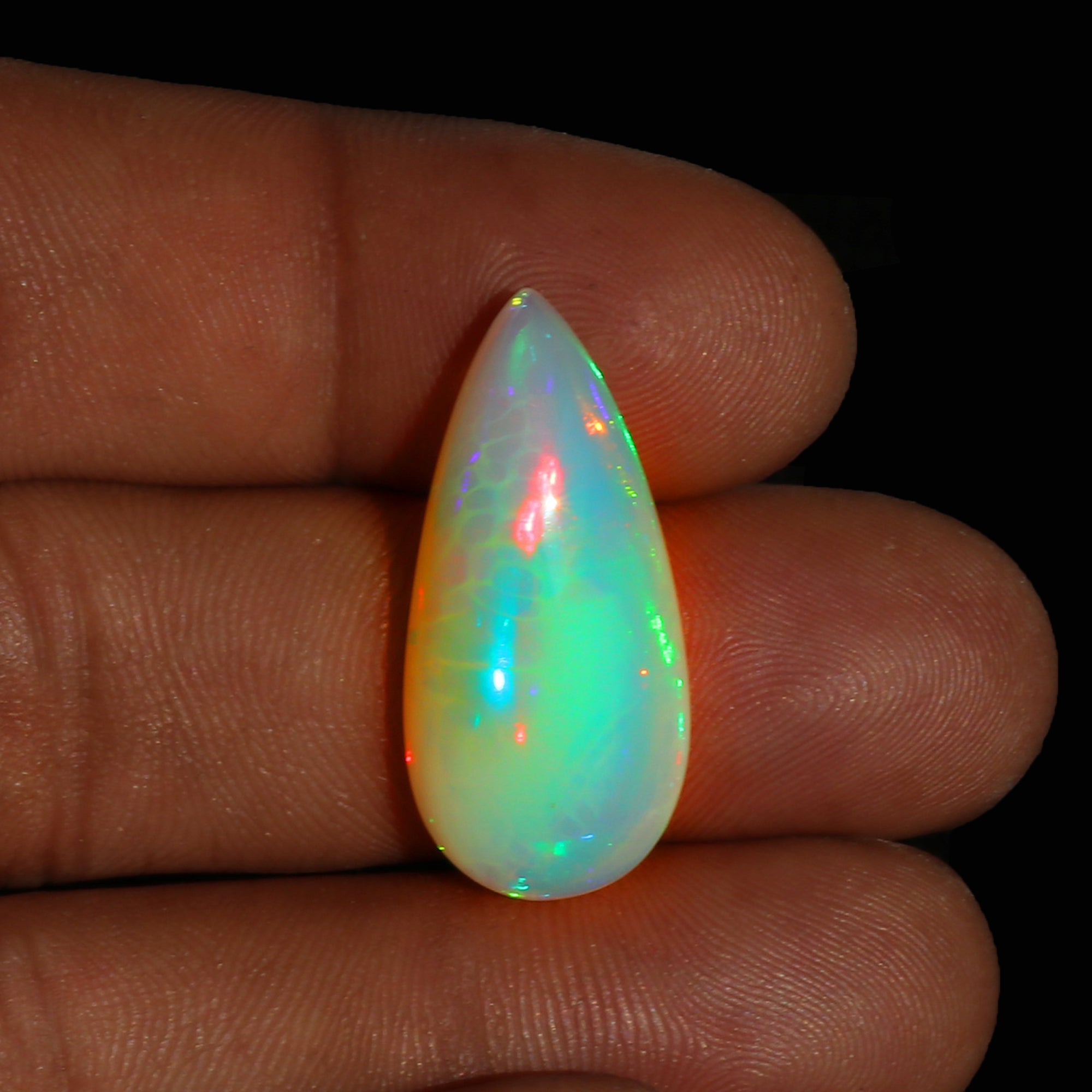 Welo Opal Cabochon: Ethiopian Honeycomb Pear Shape Gemstone (13.1 cts)