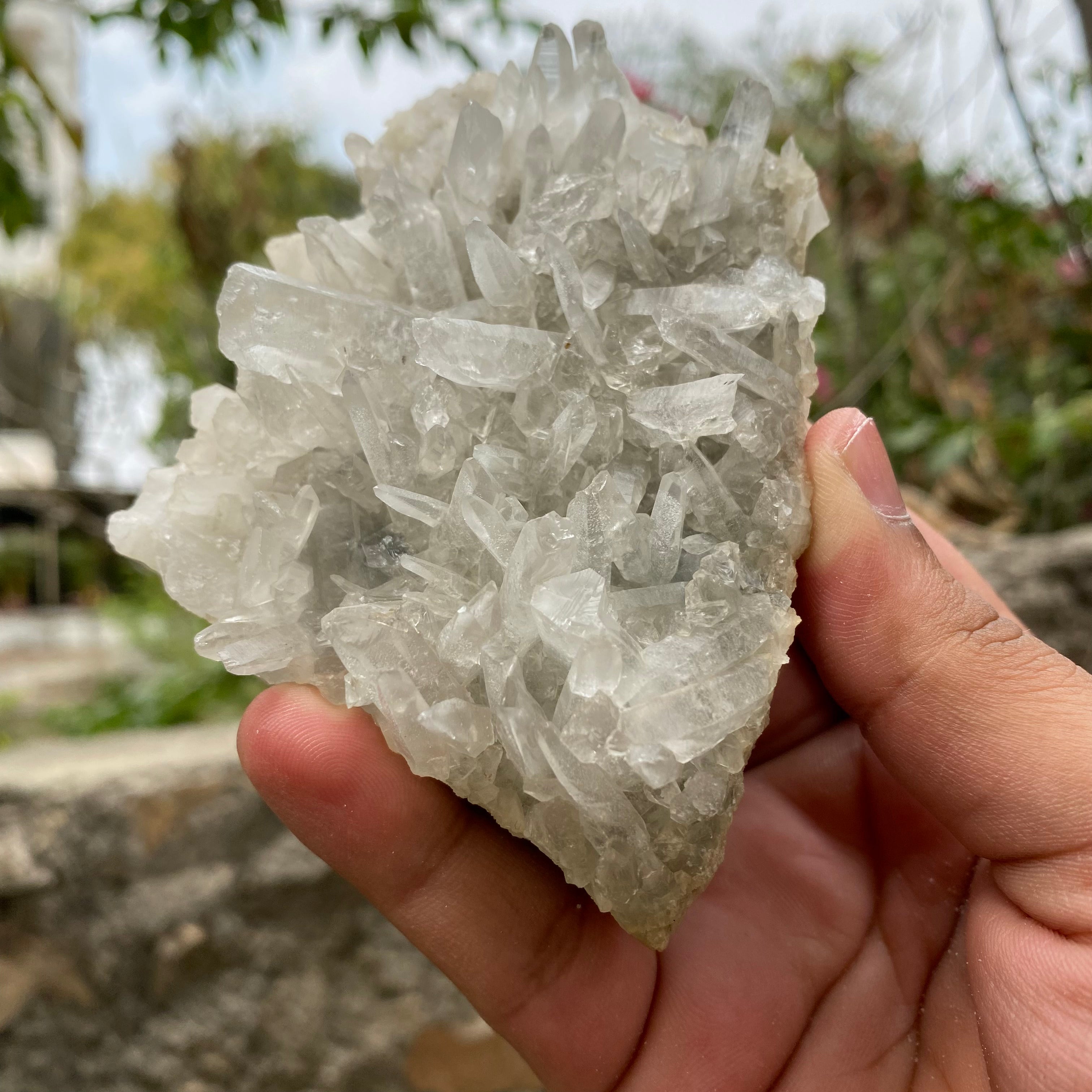Himalya Quartz Himalayan Quartz pointed green phantom quartz mineral specimen with clear quartz cluster and rough crystal formations.