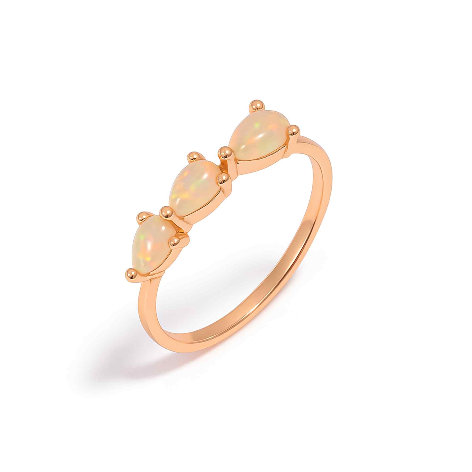 Handmade three-stone Ethiopian Opal Ringwith pear-shaped 3x5mm opals in sterling silver, boho jewelry for women.