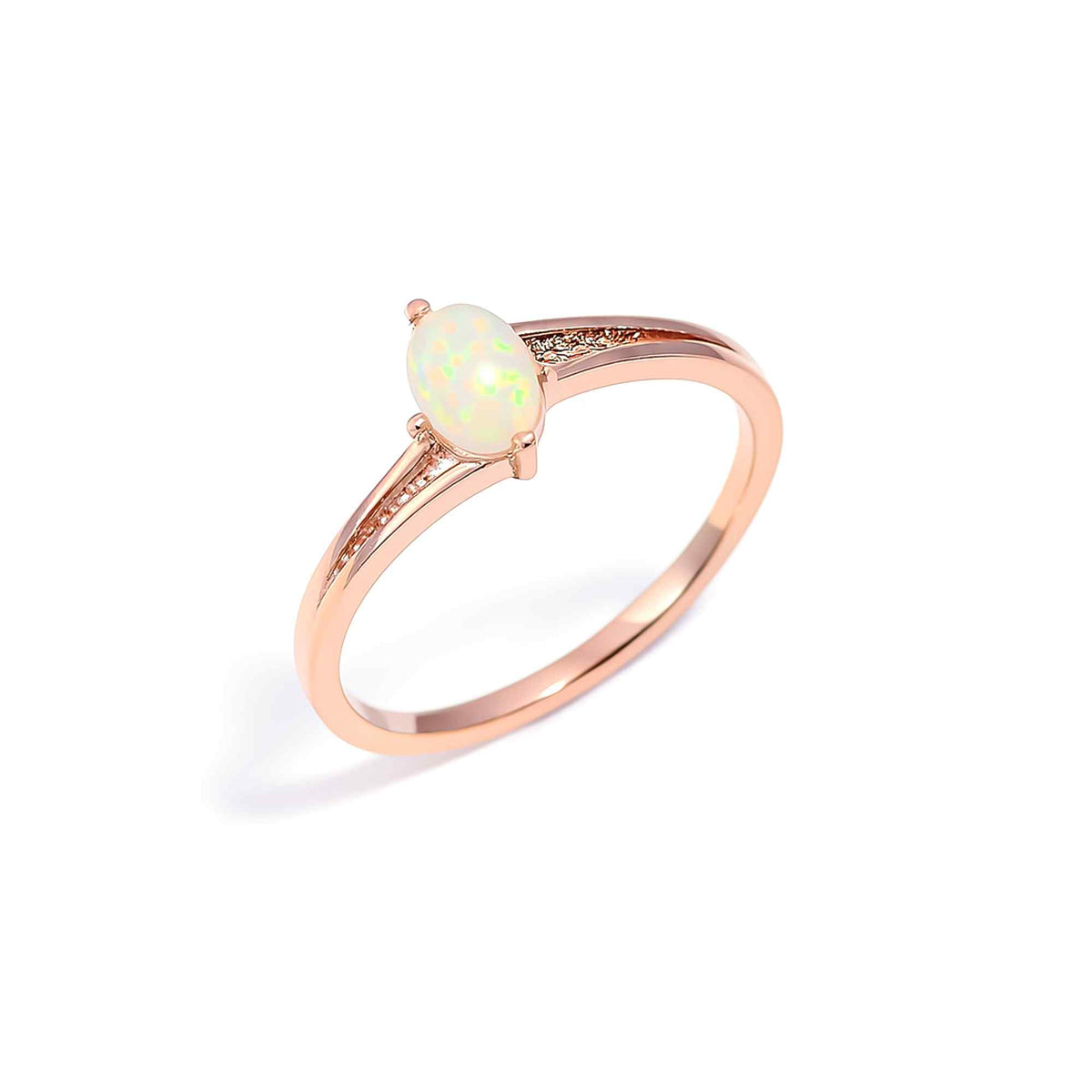 Minimal oval Ethiopian Opal Ringin 925 sterling silver with a 4x6mm opal, handcrafted jewelry by Himalya Quartz.