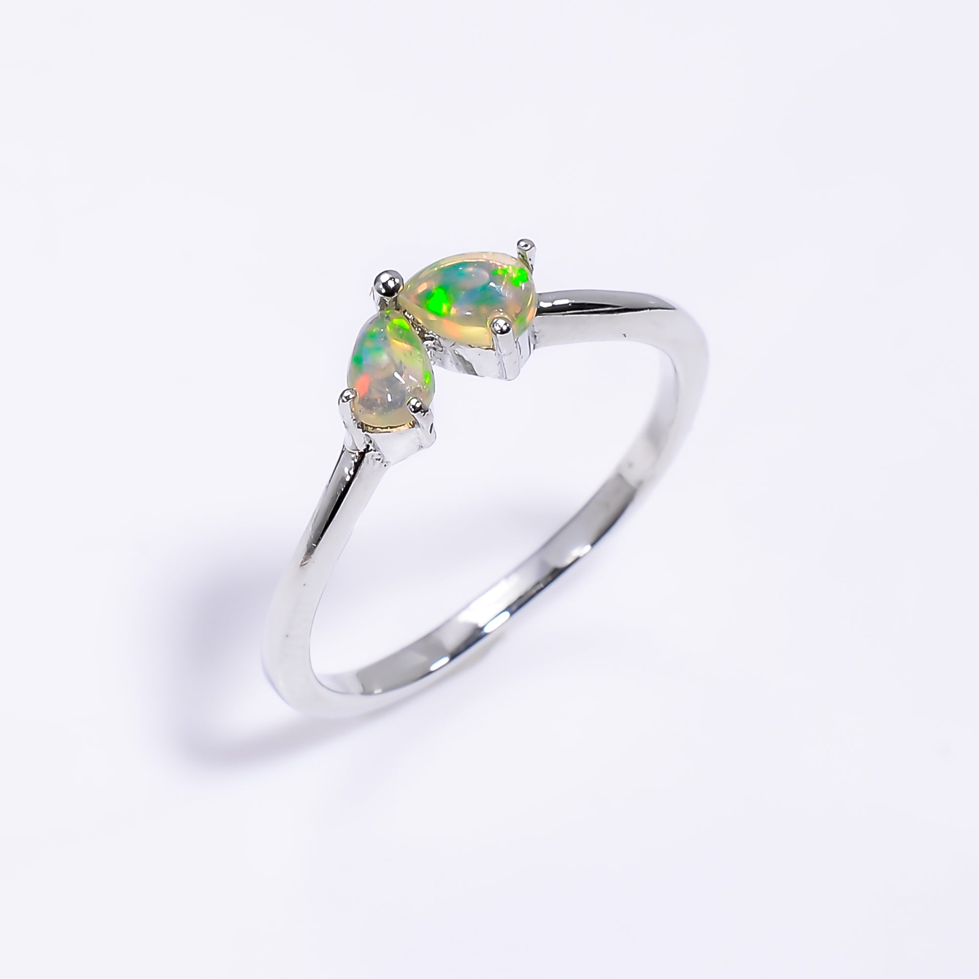 Ethiopian opal ring with 3x5mm teardrop opal in 925 sterling silver, handmade minimalist design for women.