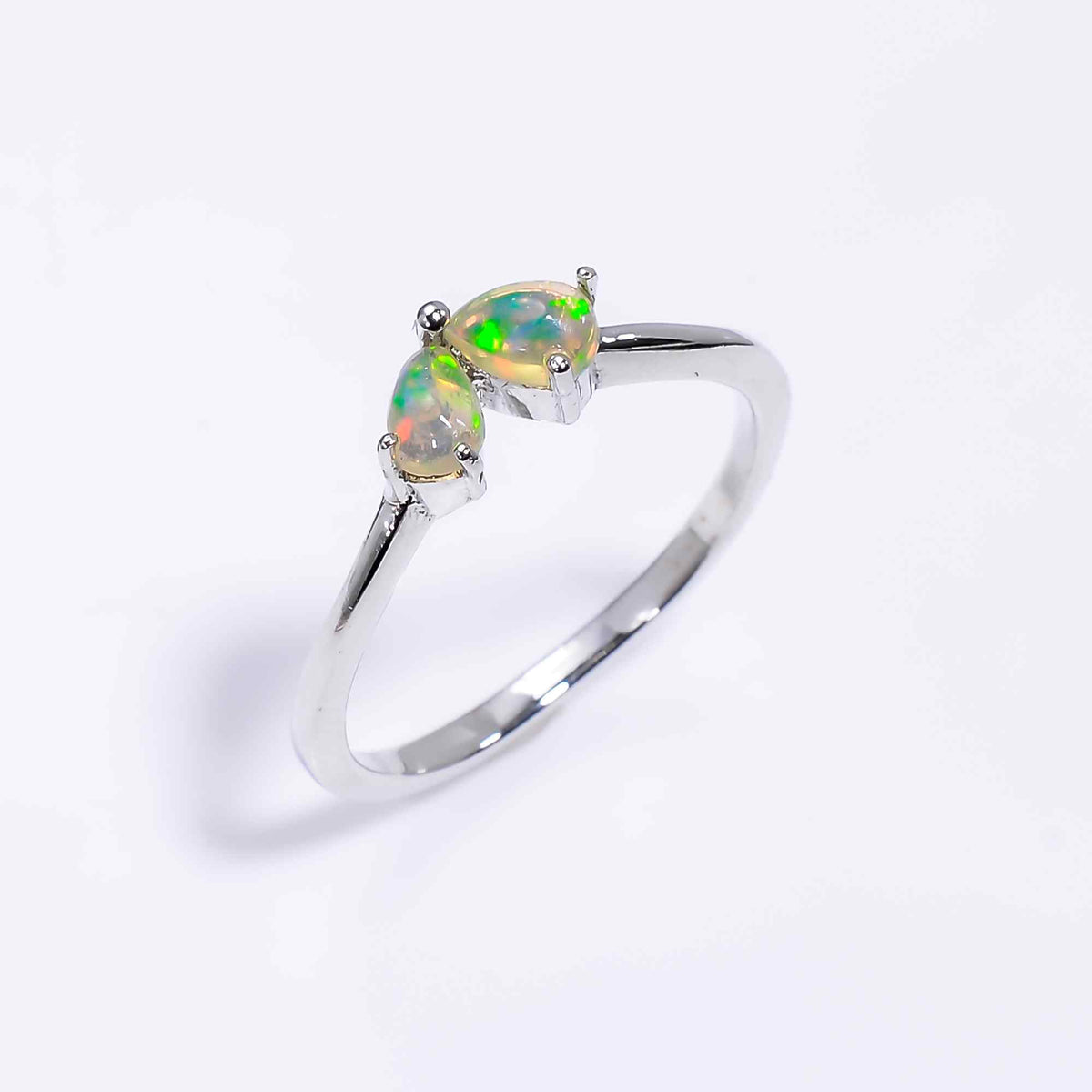 Ethiopian Opal Ringwith 3x5mm teardrop opal in 925 sterling silver, handmade minimalist design for women.