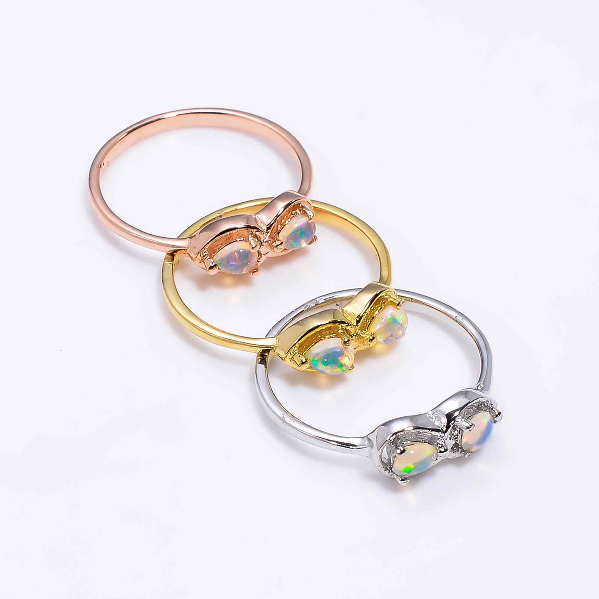 Pear cut Ethiopian Opal Ringin 925 sterling silver with handmade 3x4mm opal, designed for women, from Himalya Quartz.