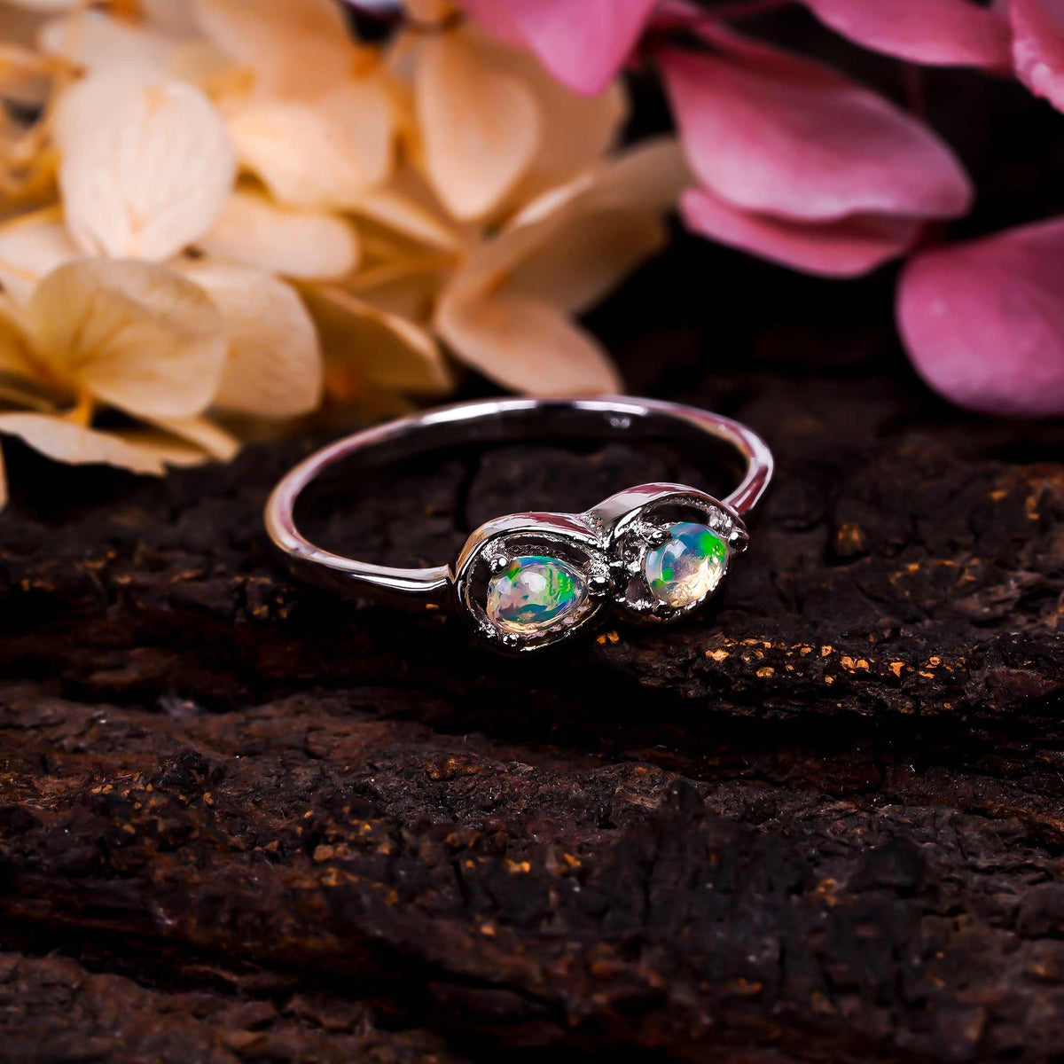 Pear cut Ethiopian Opal Ringin 925 sterling silver with a 3x4mm opal, handmade jewelry for women by Himalya Quartz.