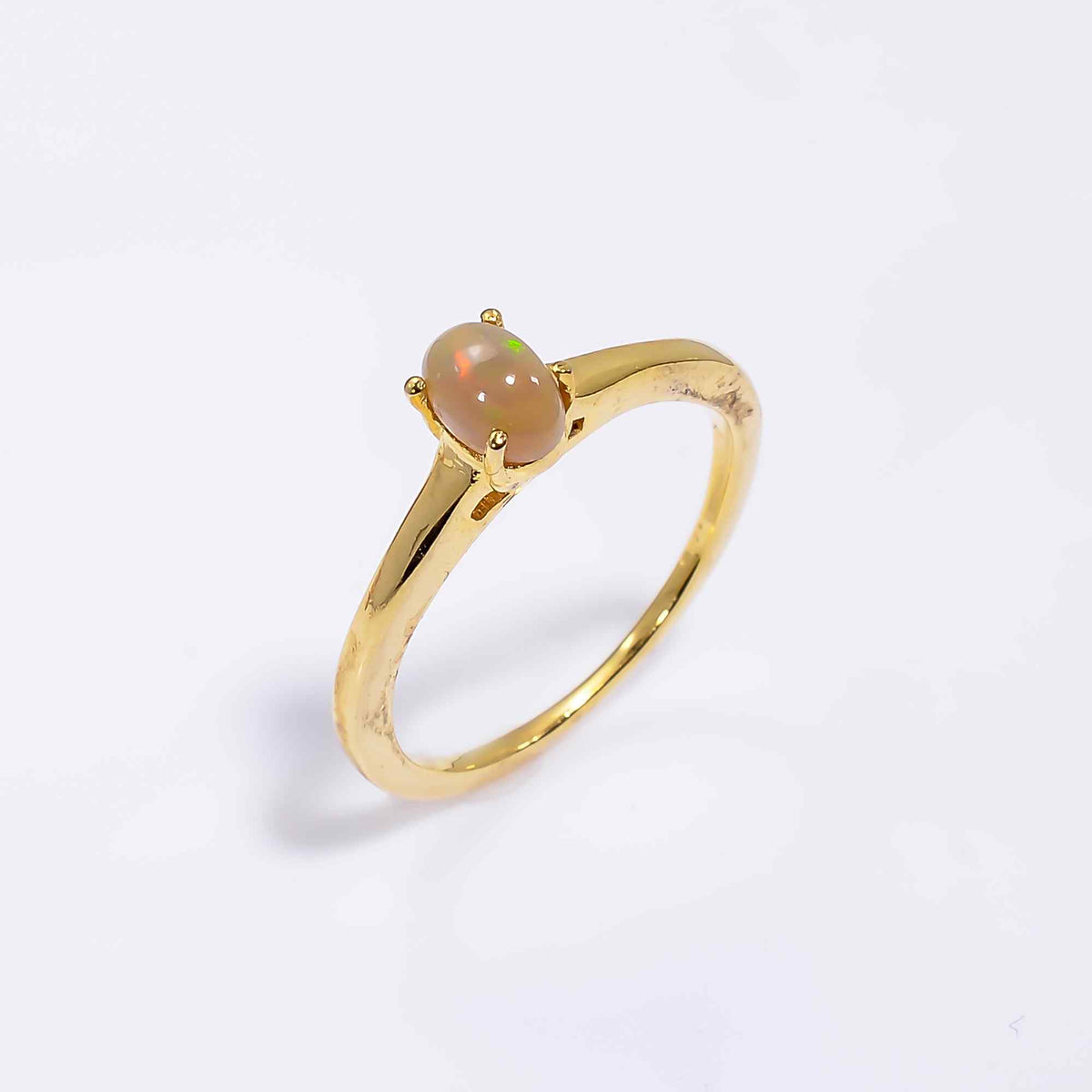 Ethiopian Opal Ringin 925 sterling silver with a 4x6mm oval opal gemstone, designed for women by Himalya Quartz.
