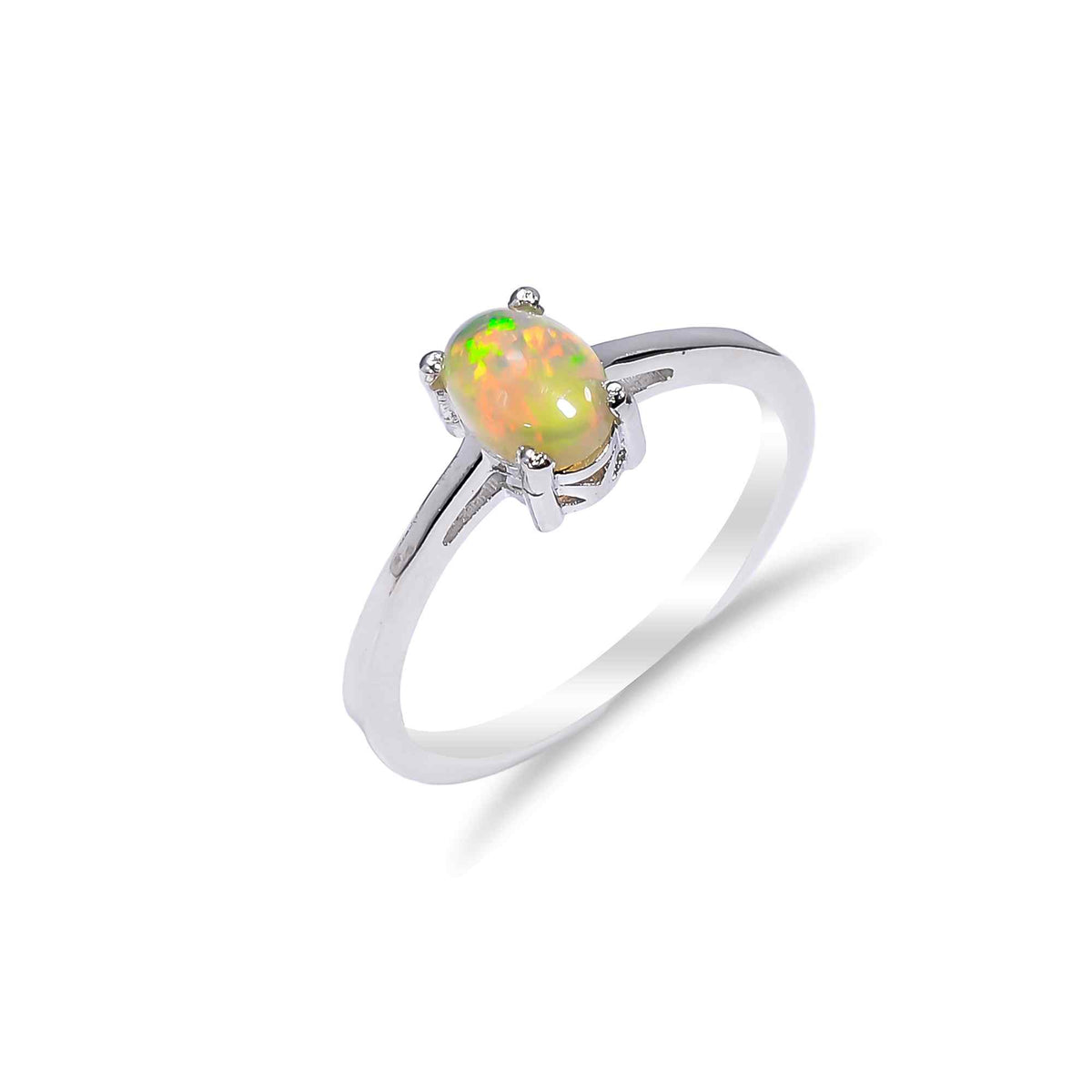 Oval Ethiopian Opal Ringin 925 sterling silver with a 7x5mm natural handmade opal, designed for women by Himalya Quartz.