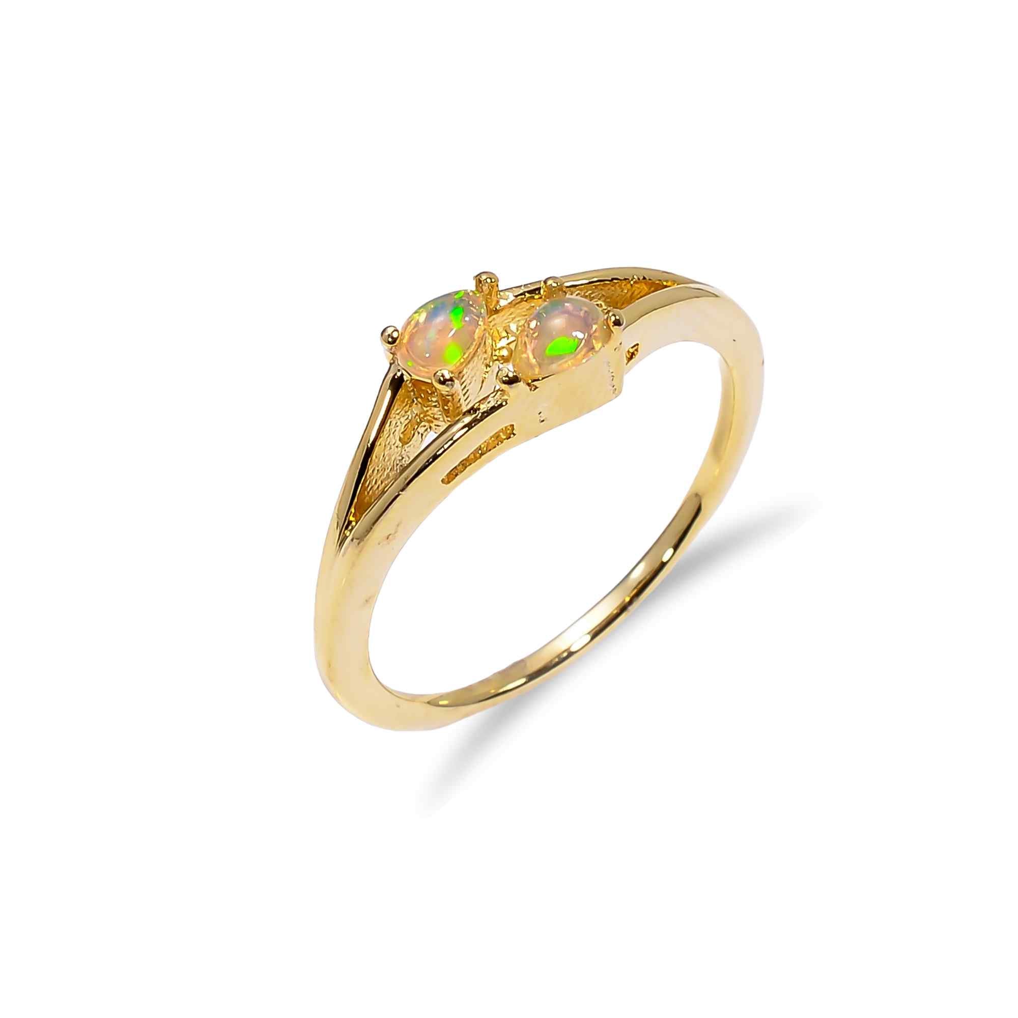 Minimalist Ethiopian Opal Ringin 925 sterling silver featuring a 3x4mm pear-shaped fire opal setting for women.