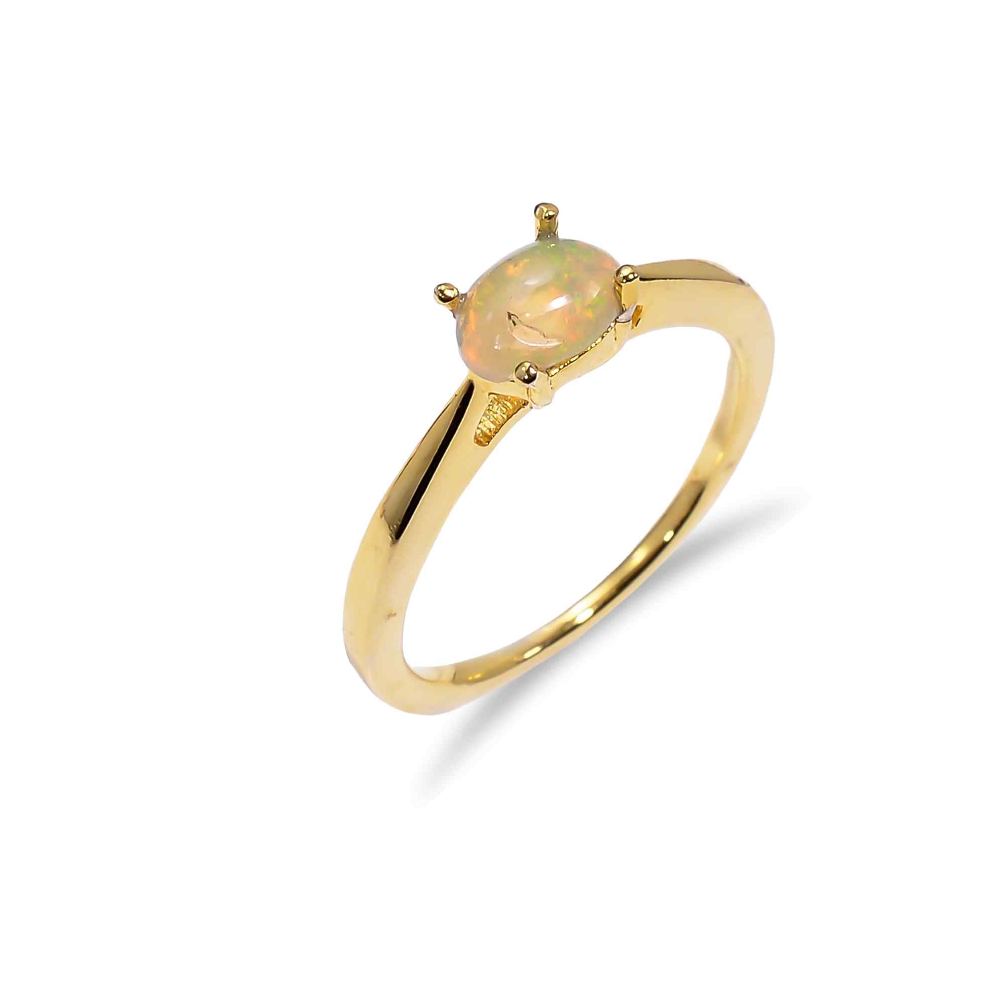 Vintage Ethiopian Opal Ringin 925 sterling silver with a 4x6mm oval fire opal, featuring detailed silver craftsmanship.