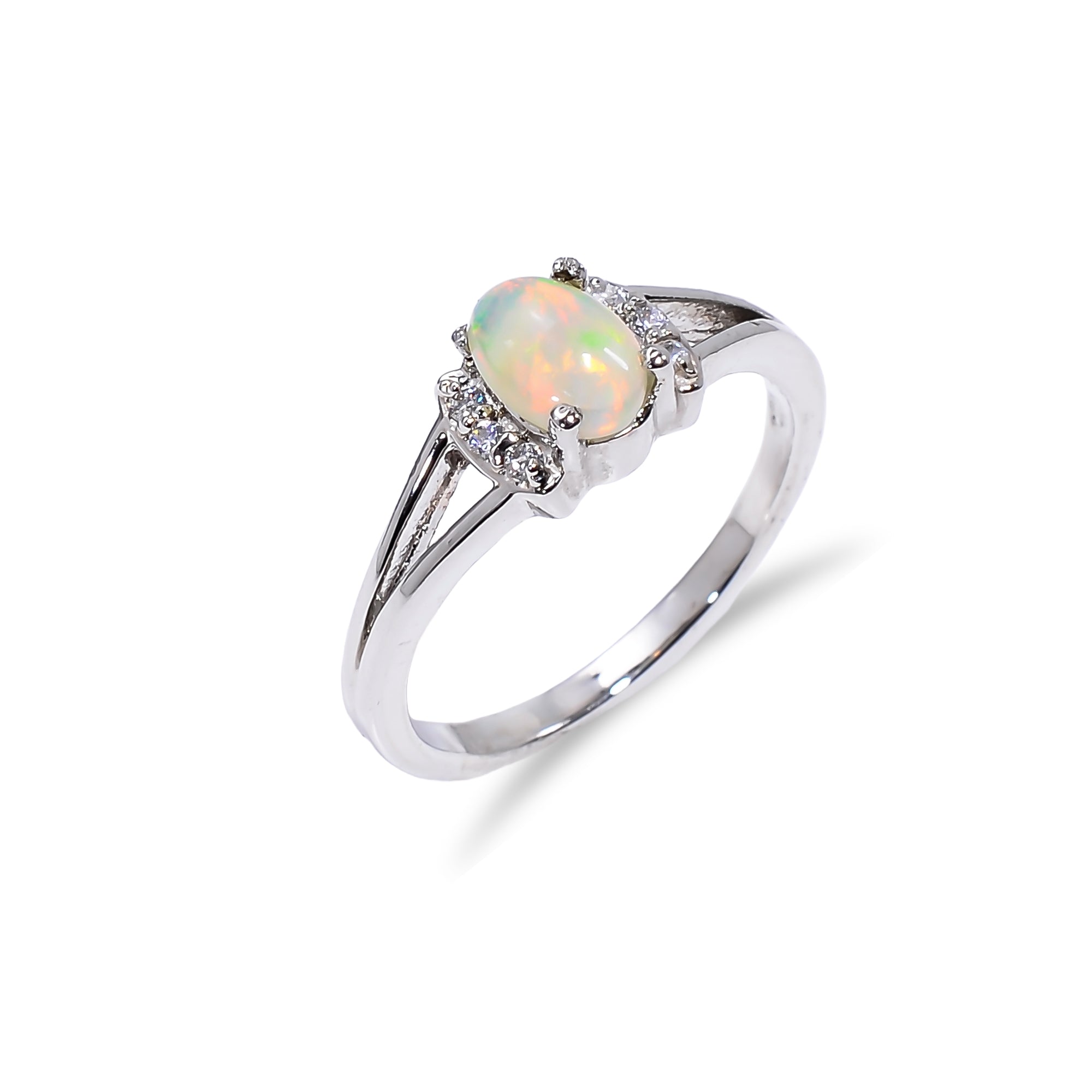 Ethiopian Opal ring with 7x5mm oval gemstone set in sterling silver, handmade minimalist design for women.