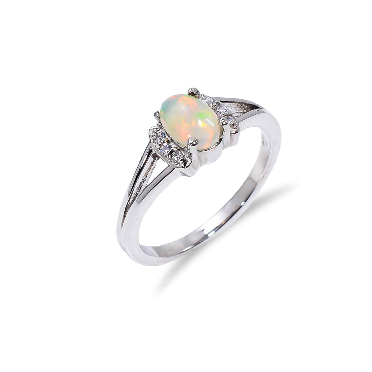 Ethiopian Opal Ringwith 7x5mm oval gemstone set in sterling silver, handmade minimalist design for women.