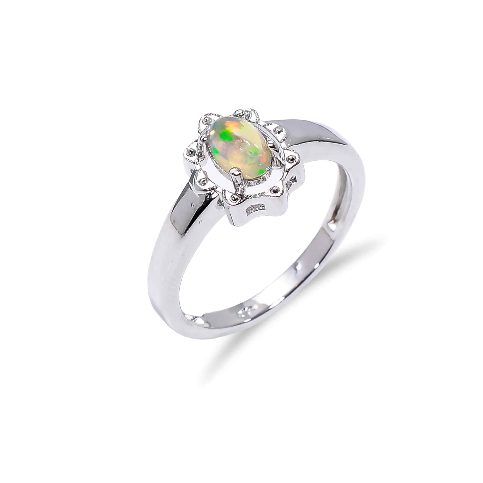 Natural Ethiopian opal gemstone ring with 4x6mm oval opal, sterling silver band, designed for women by Himalya Quartz.