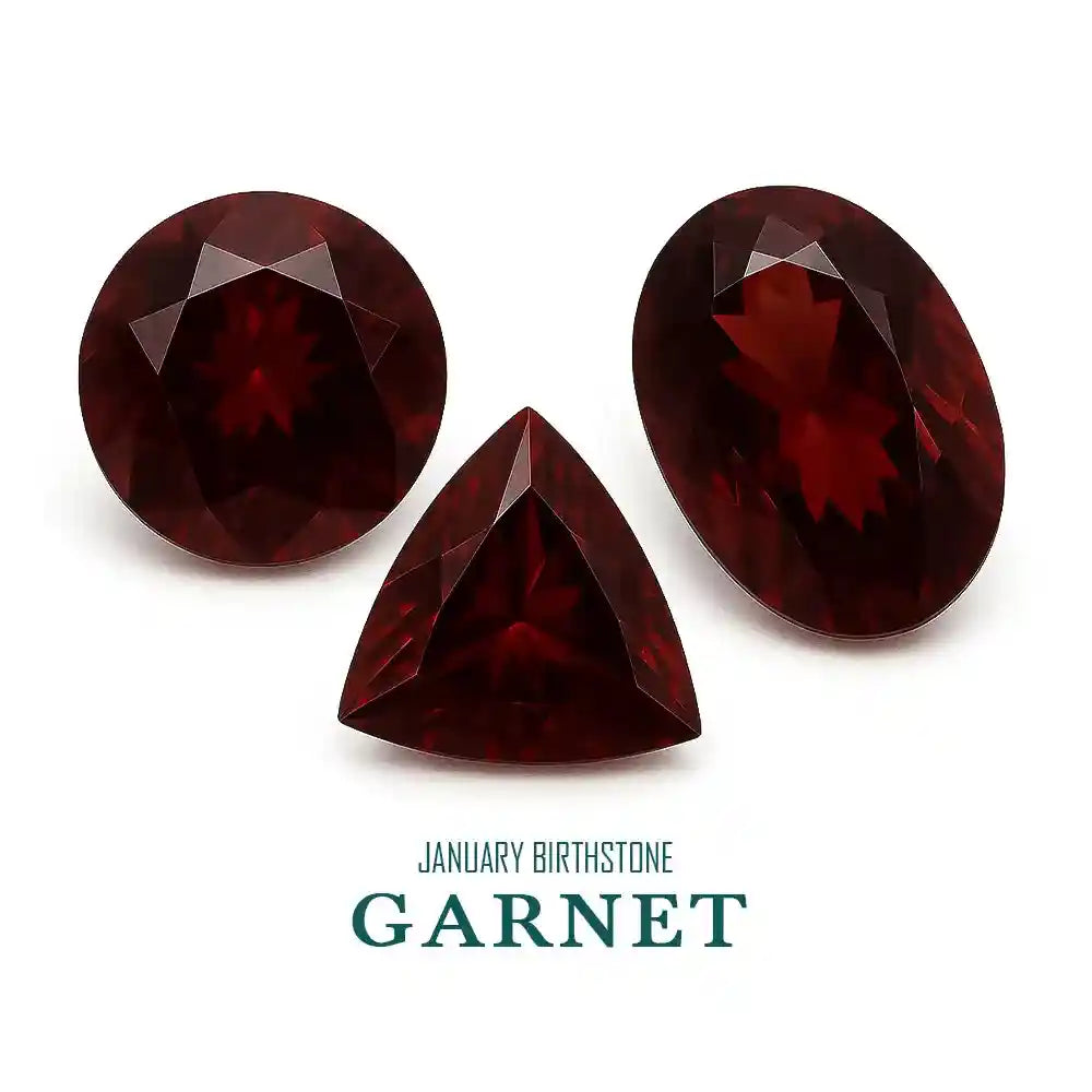 Three garnet gemstones on a white background with 'January Birthstone Garnet' text.