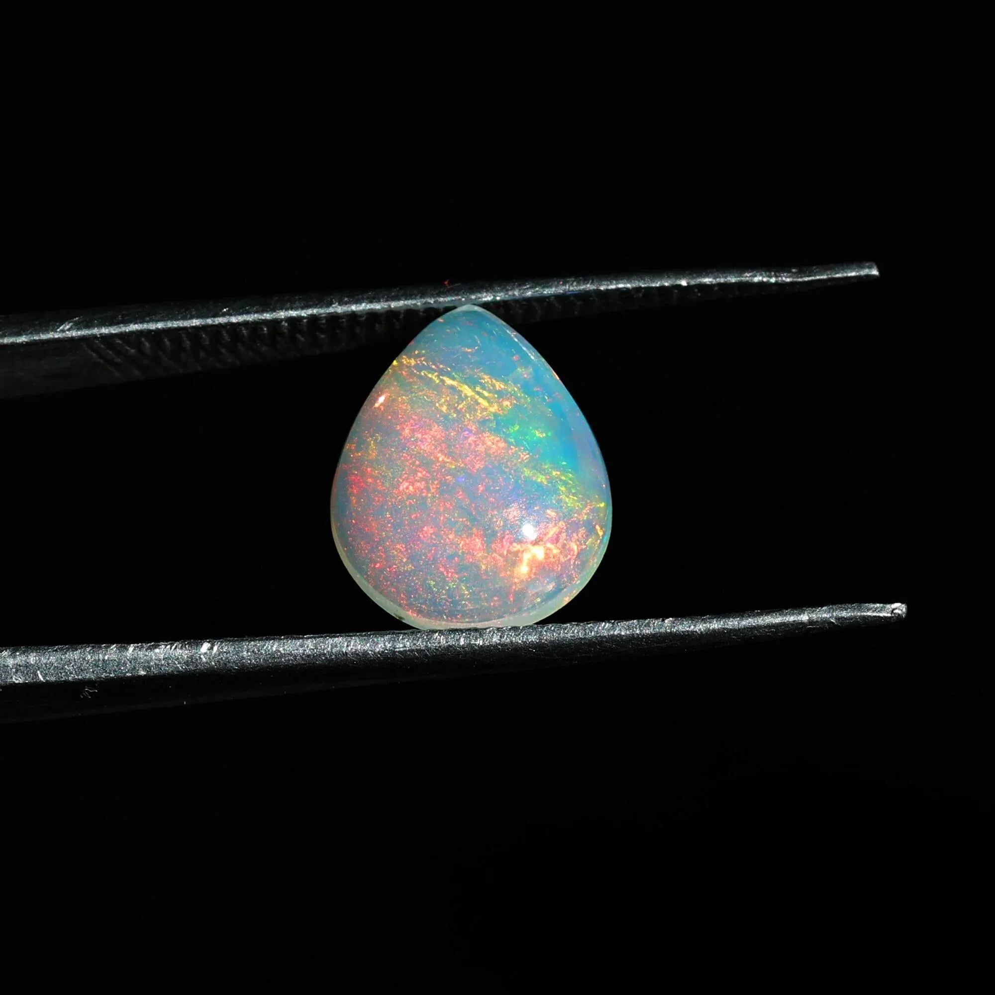 1.90 Carat Welo Fire Opal Cabochon: Pear-Cut Ethiopian Gemstone - Himalya Quartz