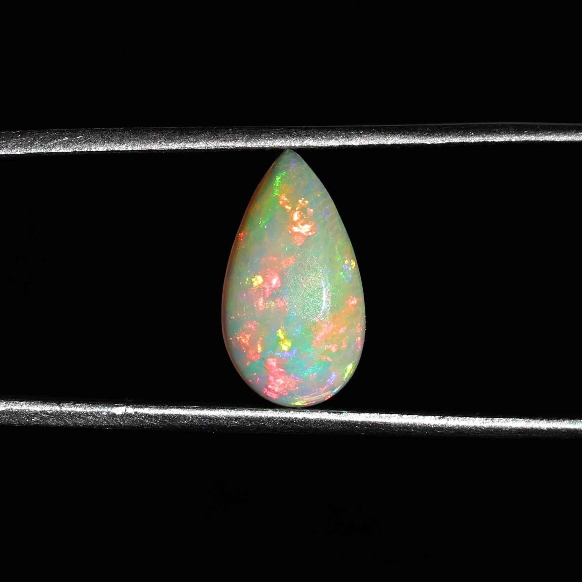 Loose 1.40 carat Ethiopian fire opal cabochon from Himalya Quartz, showcasing vibrant orange and fiery gemstone for jewelry making