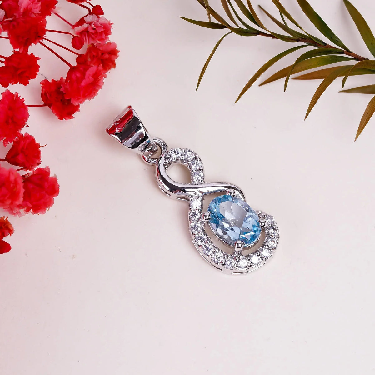 Natural Sky Blue Topaz 6x8mm Oval Pendant in 925 Sterling Silver