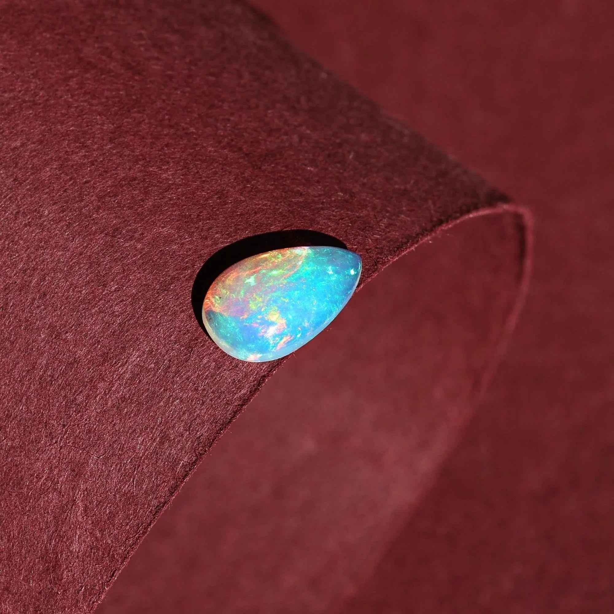 Ethiopian White Opal Cabochon: 1.25 Carat Pear-Shaped Gemstone loose gemstones