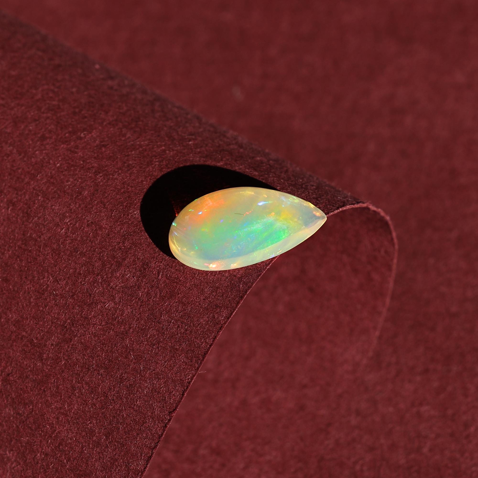 White Ethiopian Opal Cabochon: 3.30 Carat Pear-Shaped Fire Opal Gemstone