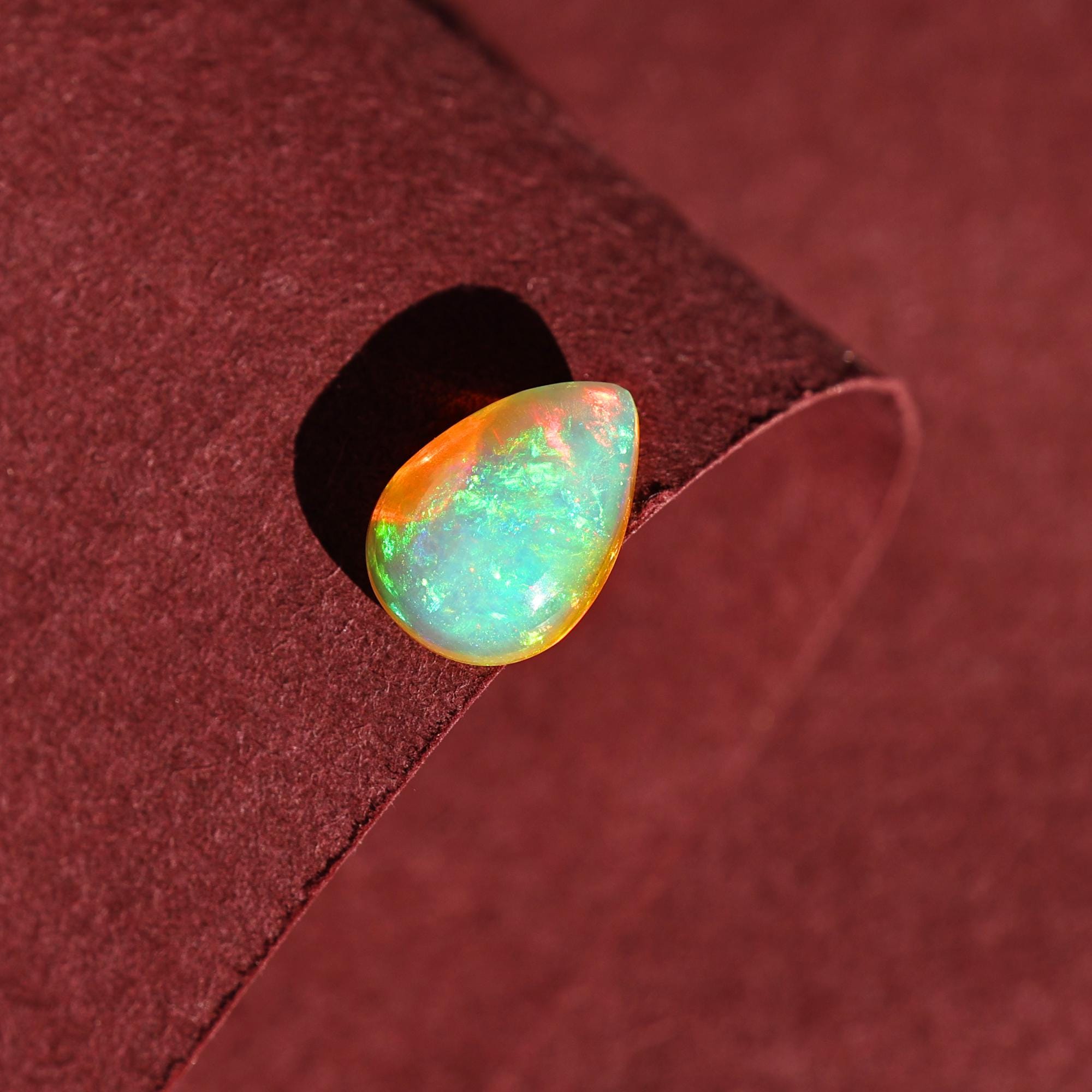 White Ethiopian Welo Fire Opal Cabochon: 2 Carat Pear Cut Gemstone
