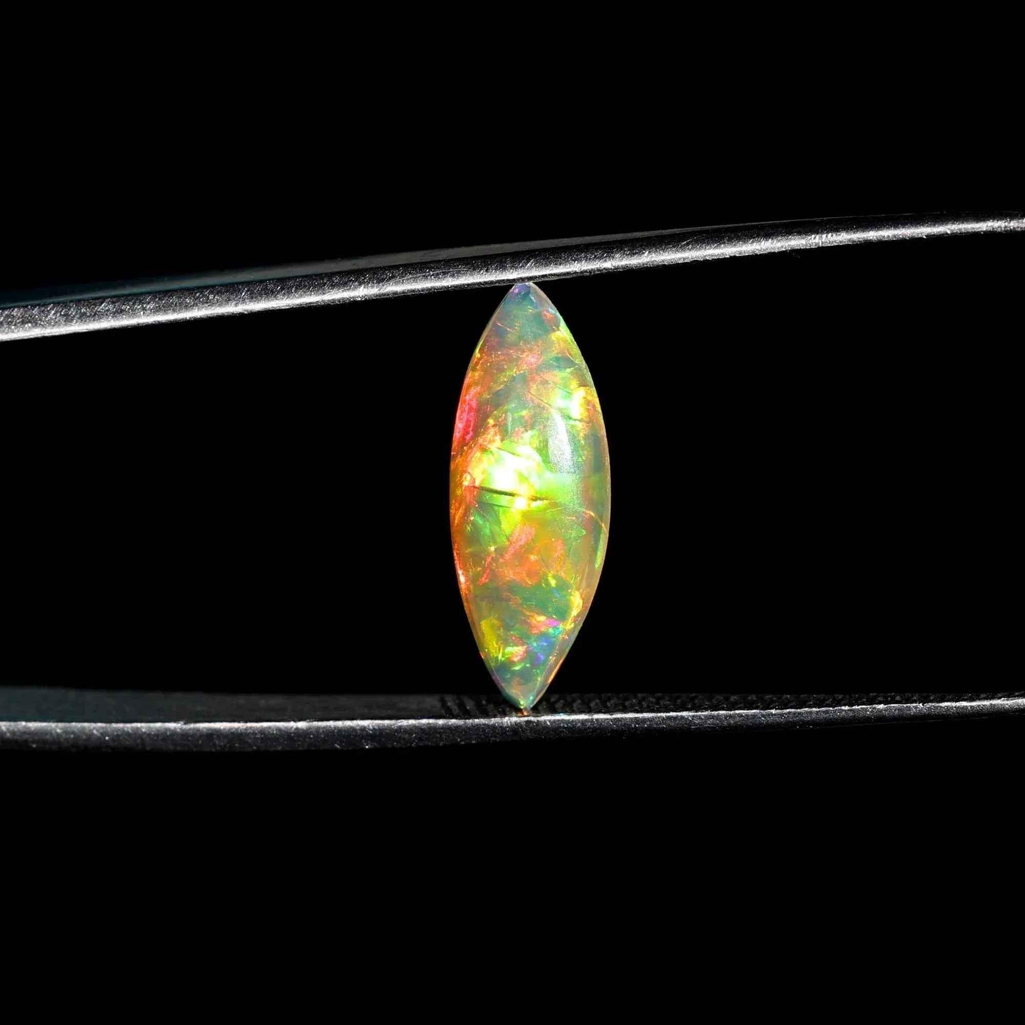 Milky White Ethiopian Opal Gemstone: 1.60 Carat Marquise Cabochon loose gemstones