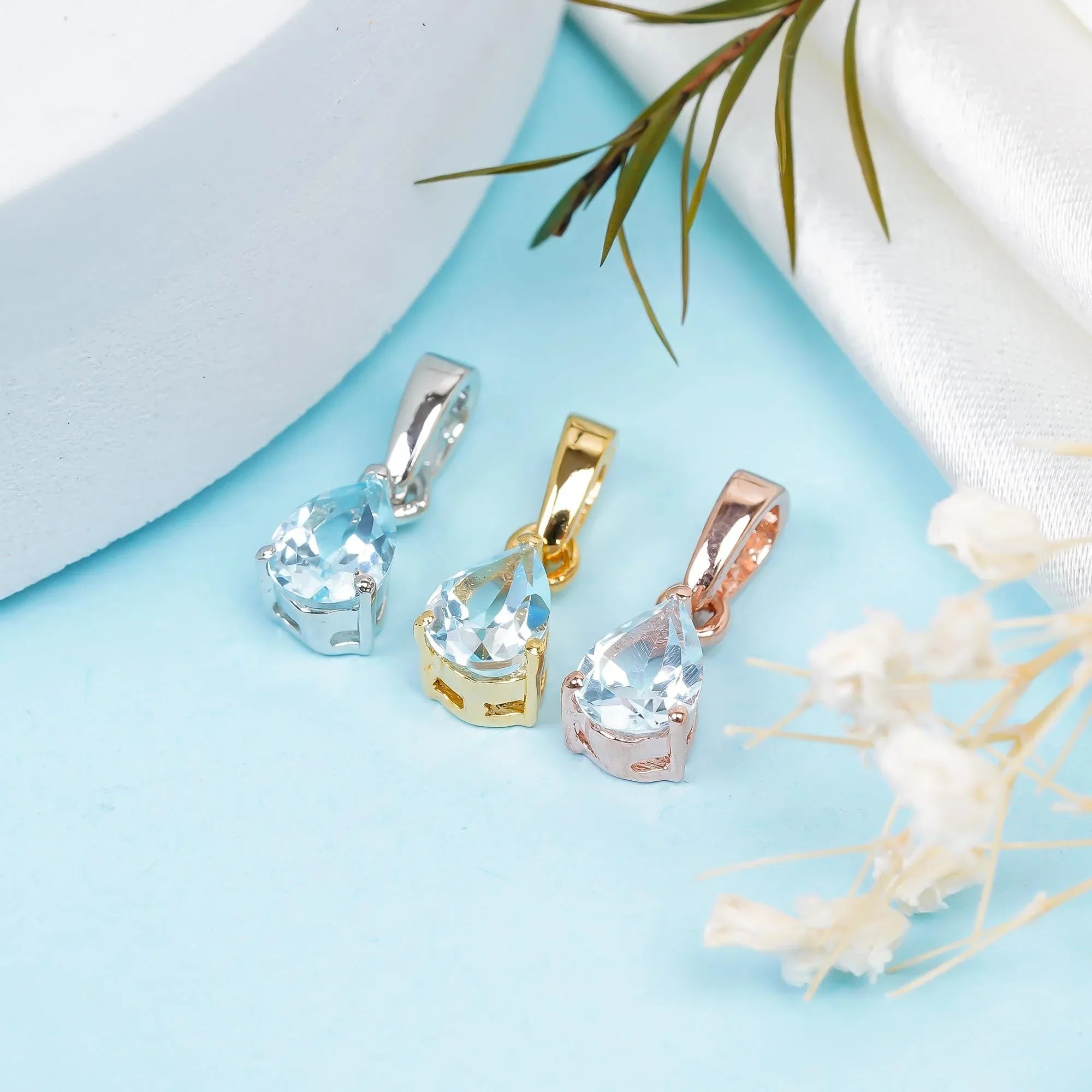 Handmade Sky Blue Topaz Pendant: 925 Sterling Silver Teardrop (5x7mm) - Himalya Quartz