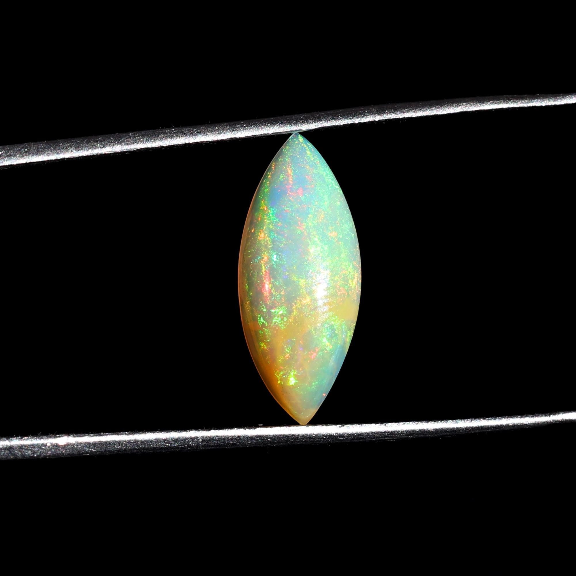 1.56 Carat Marquise White Ethiopian Opal Cabochon: Fire Opal Gemstone