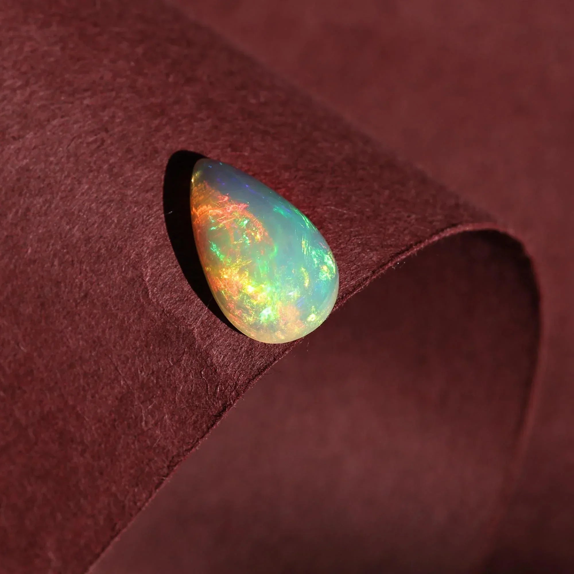 Natural White Ethiopian Fire Opal Cabochon: Pear Shape Loose Gemstone, 3.45 Carat loose gemstones