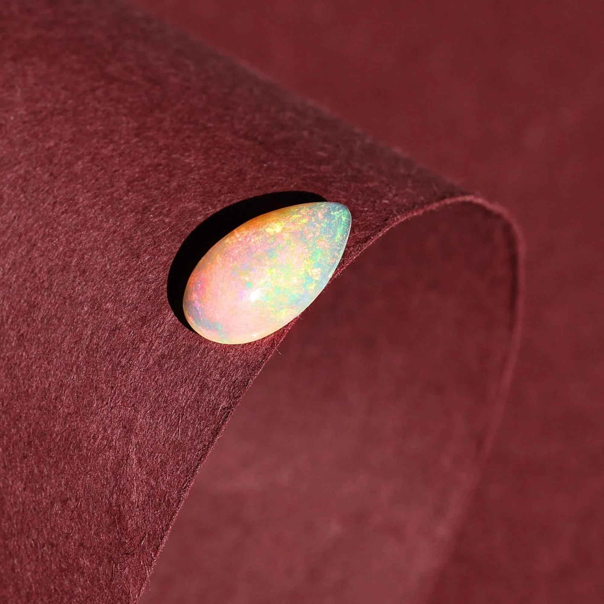 AAA+ Quality White Ethiopian Opal Cabochon: 2.25 Carat Pear-Shaped Gemstone loose gemstones
