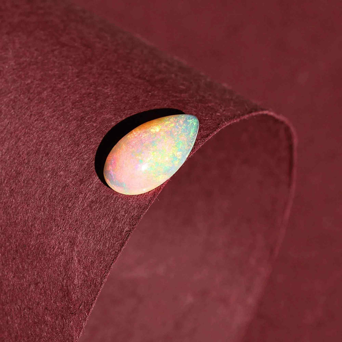 AAA+ Quality White Ethiopian Opal Cabochon: 2.25 Carat Pear-Shaped Gemstone Loose Gemstones