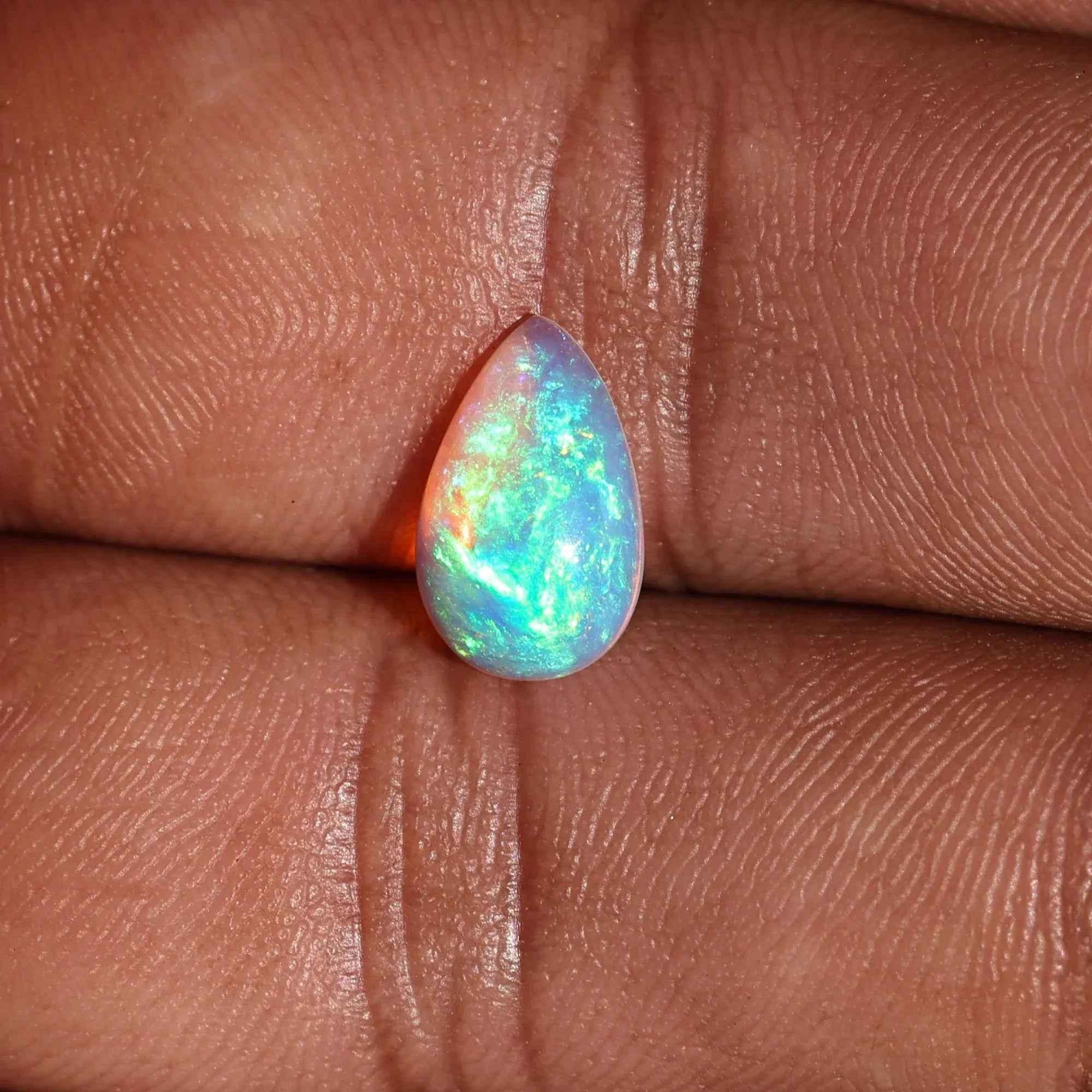 Ethiopian White Opal Cabochon: 1.25 Carat Pear-Shaped Gemstone loose gemstones