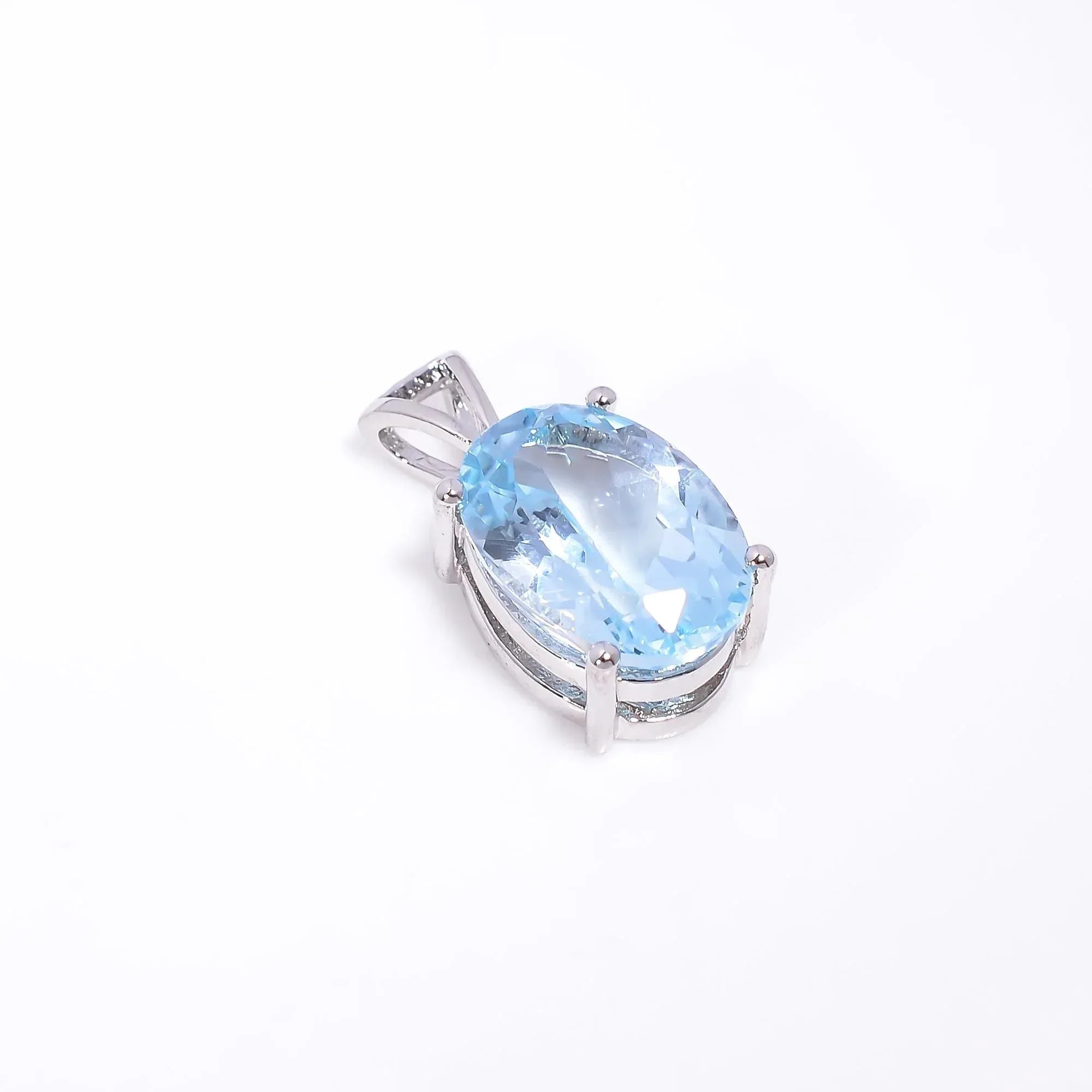 Handmade Oval Swiss Blue Topaz Pendant: Sterling Silver (10x14mm)