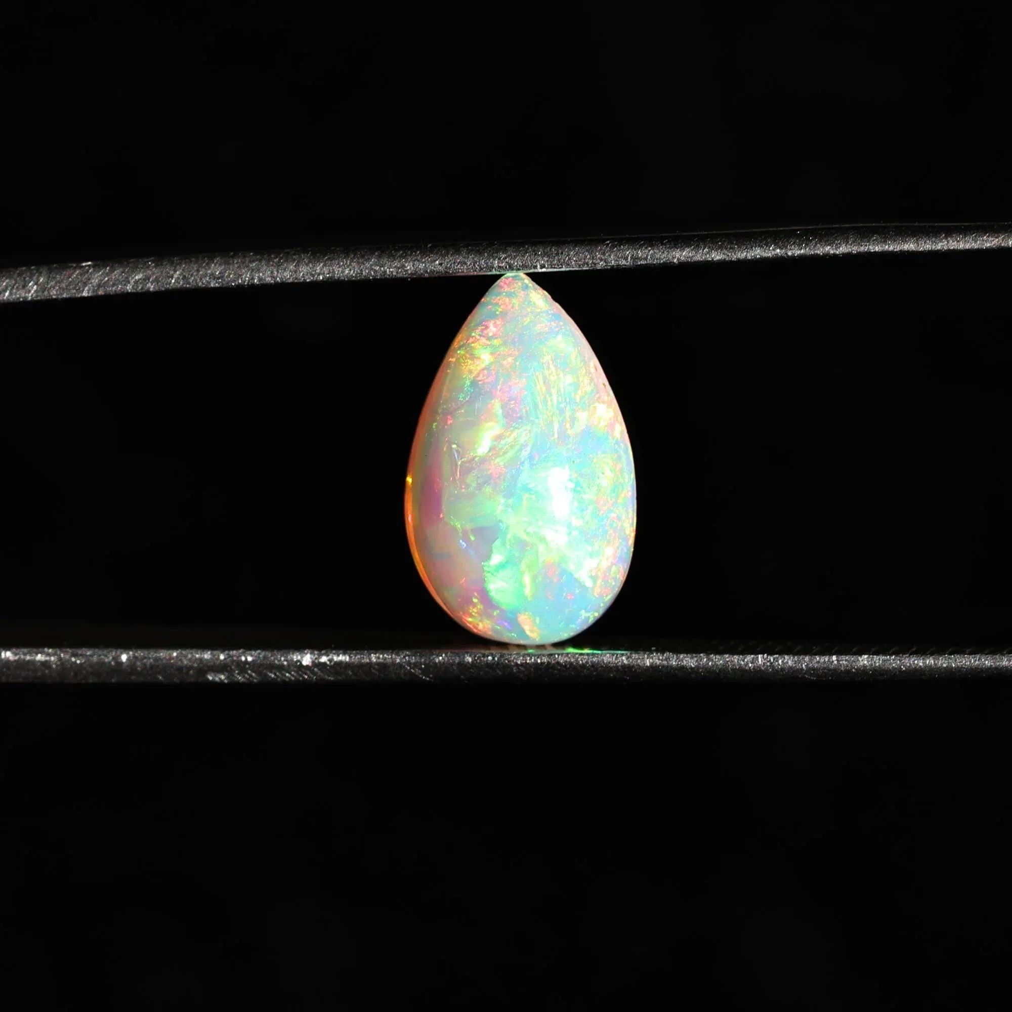 1.75 Carat White Ethiopian Fire Opal Gemstone: Pear Cabochon for Jewelry - Himalya Quartz