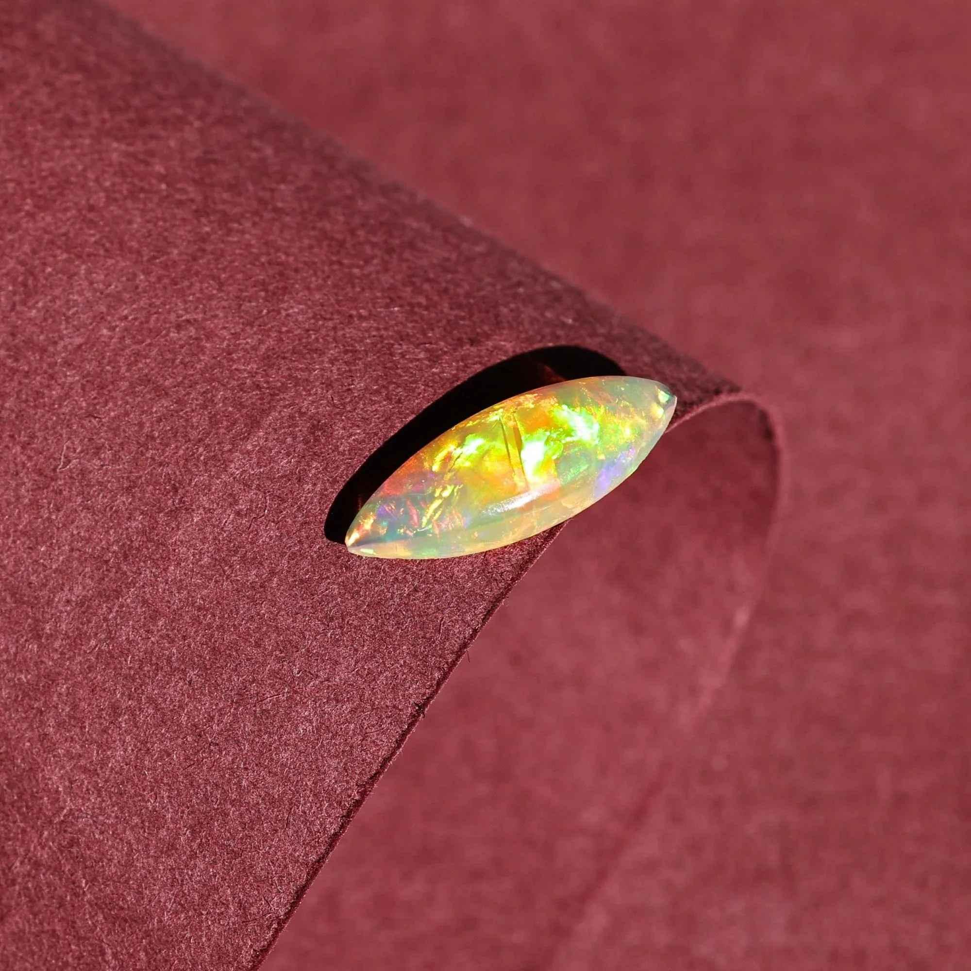 Milky White Ethiopian Opal Gemstone: 1.60 Carat Marquise Cabochon loose gemstones
