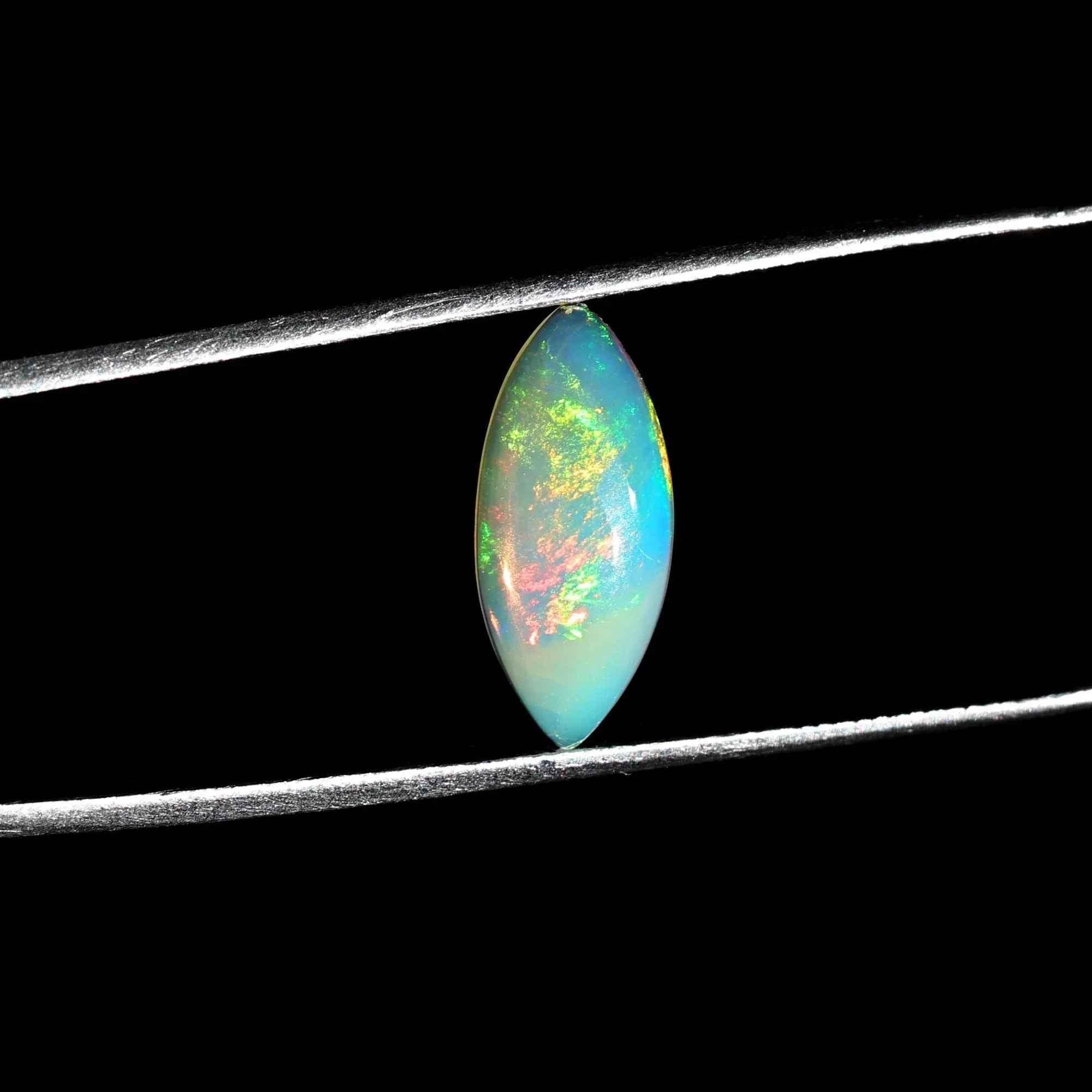 Ethiopian Opal Cabochon: White Marquise Fire Opal (1.35 Carat, 7x15mm) loose gemstones