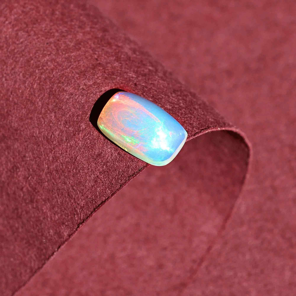 1.58 Carat Ethiopian Opal Gemstone: Rainbow Fire, Long Cushion Cabochon Loose Gemstones