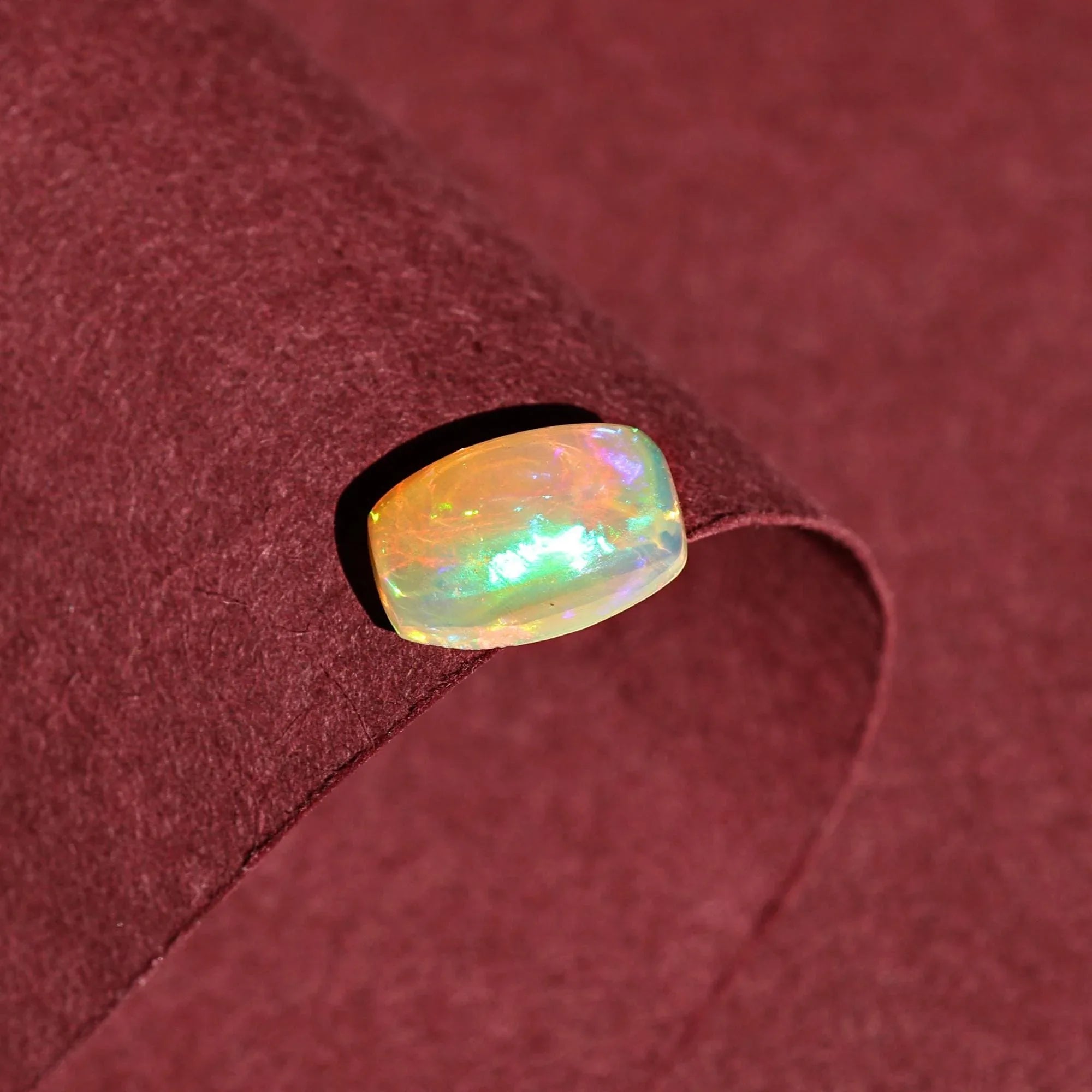 1.50 Carat Ethiopian Fire Opal Gemstone: Long Cushion Cabochon - Himalya Quartz