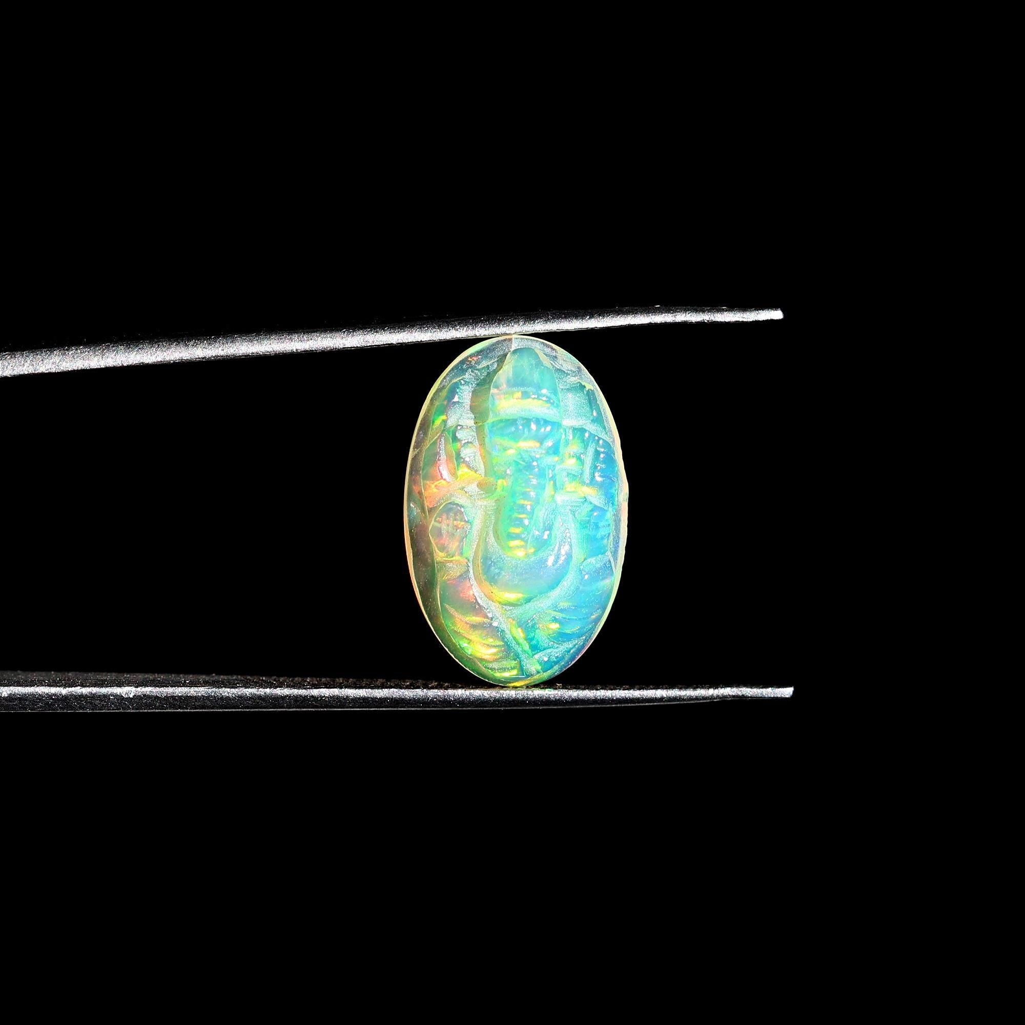 Ethiopian Opal Ganesha Carving: Oval Gemstone Statue (10x16mm)