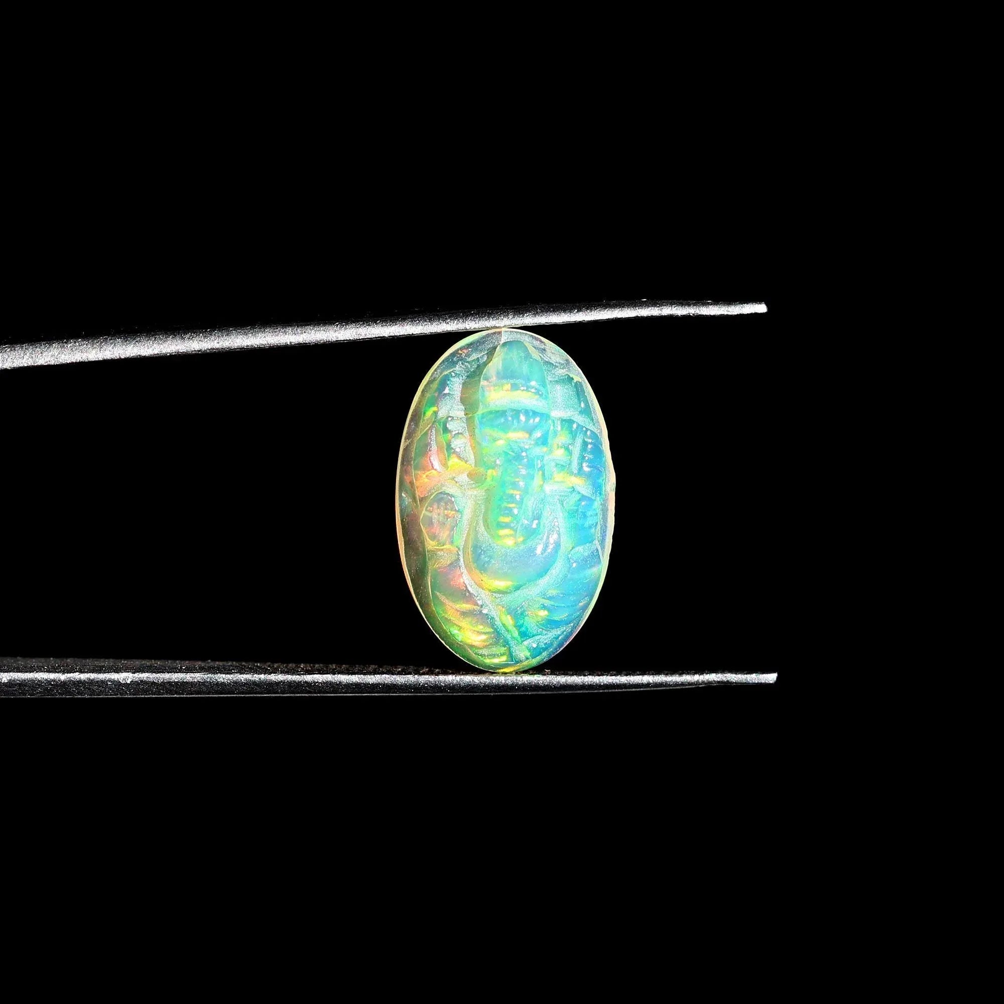 Ethiopian Opal Ganesha Carving: Oval Gemstone Statue (10x16mm) loose gemstones