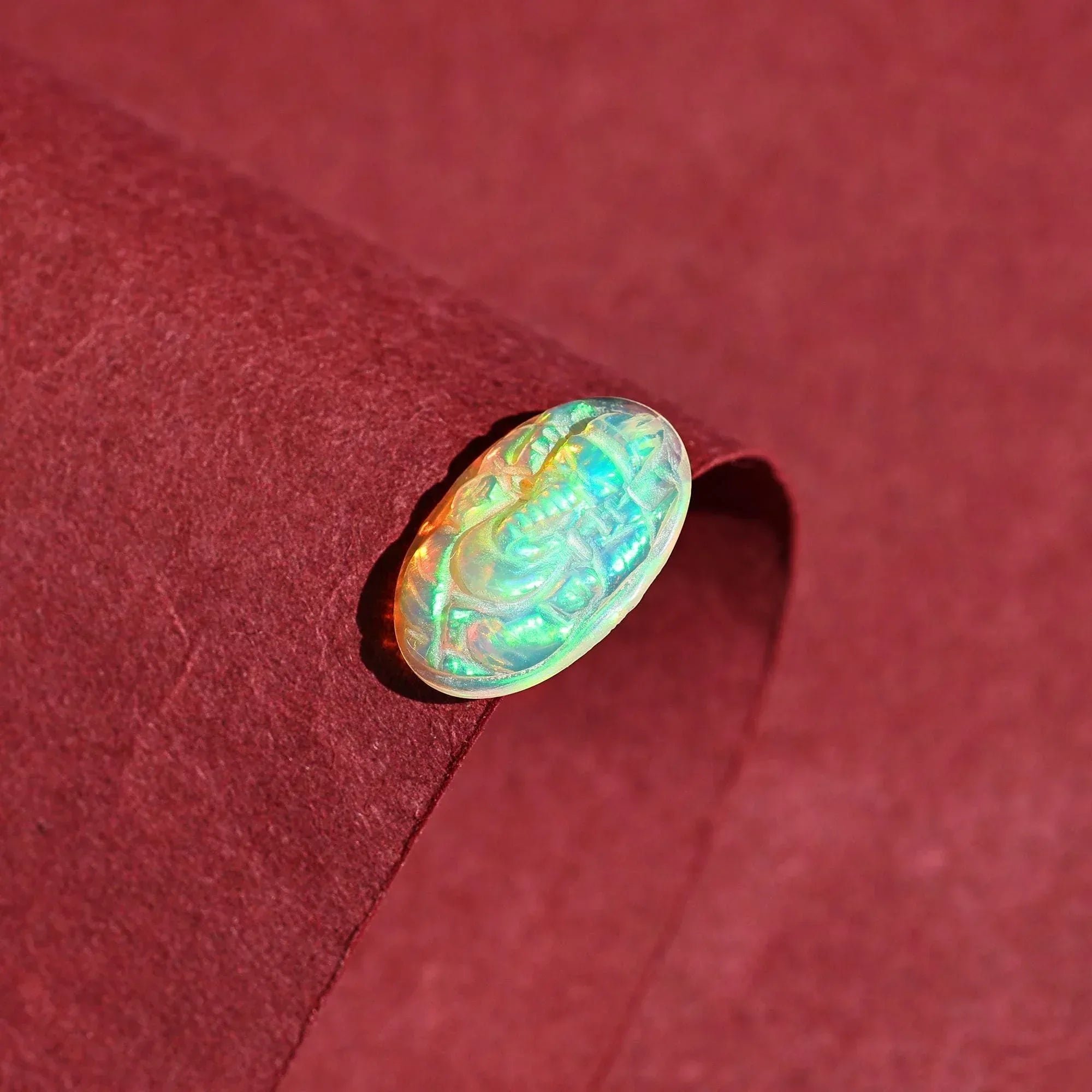 Ethiopian Opal Ganesha Carving: Oval Gemstone Statue (10x16mm) loose gemstones