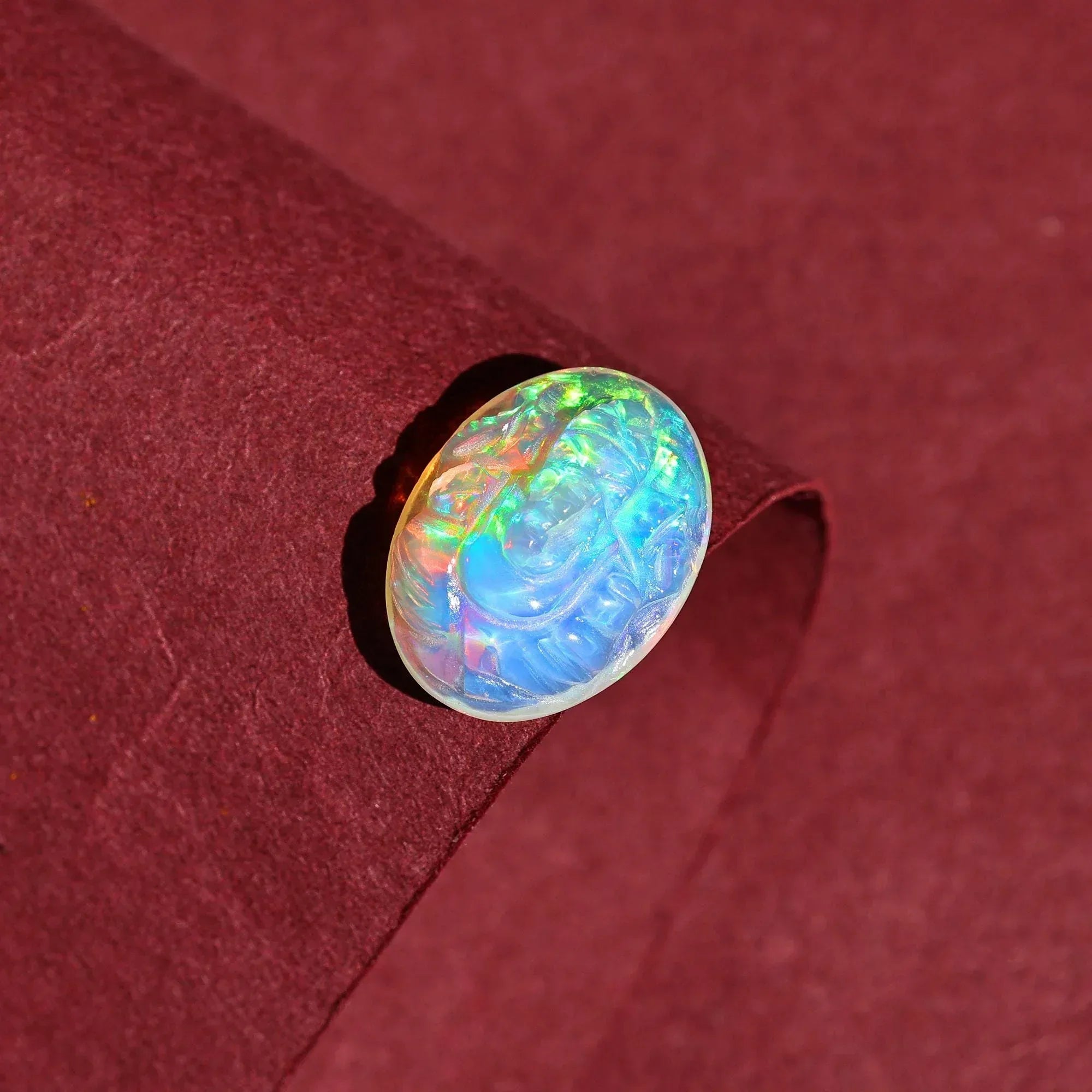5.10 Carat Carved Ethiopian Opal Ganesha Gemstone (12x16mm) loose gemstones