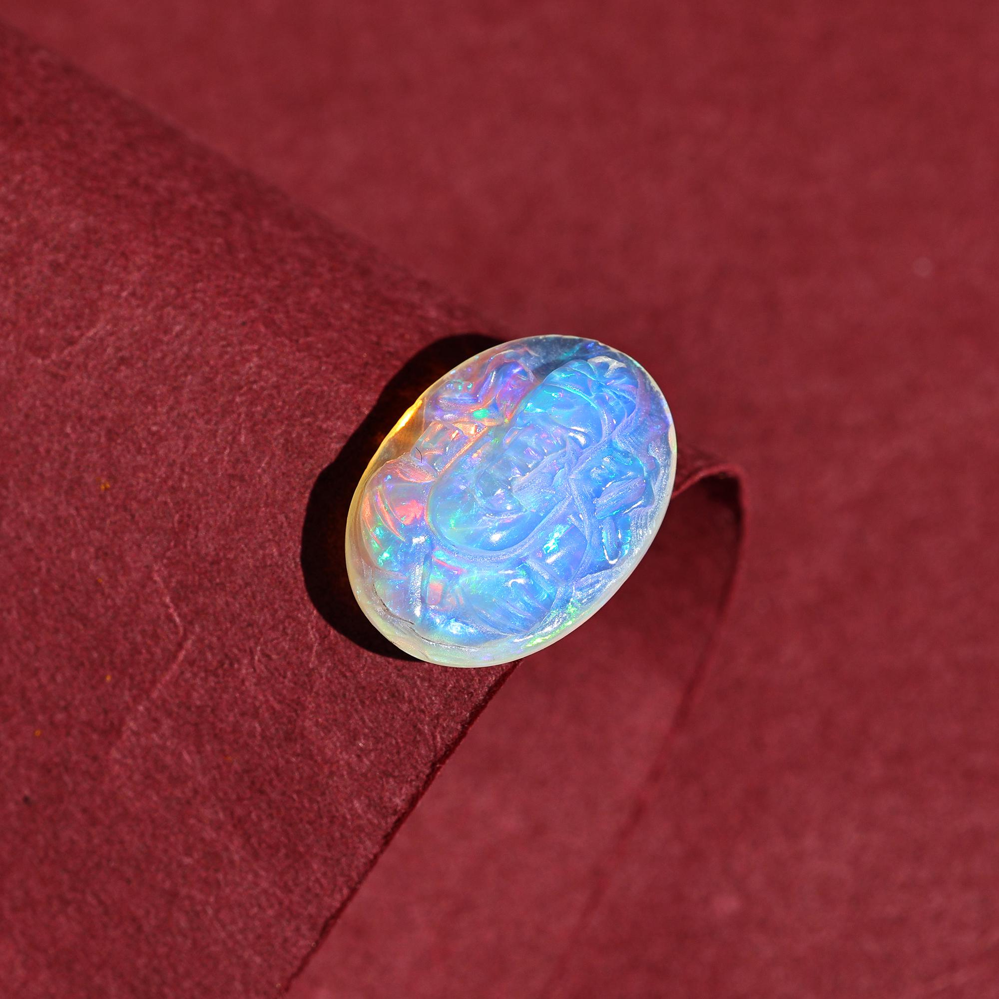 6.50 Carat White Opal Ganesha Carving: Ethiopian Gemstone Cabochon