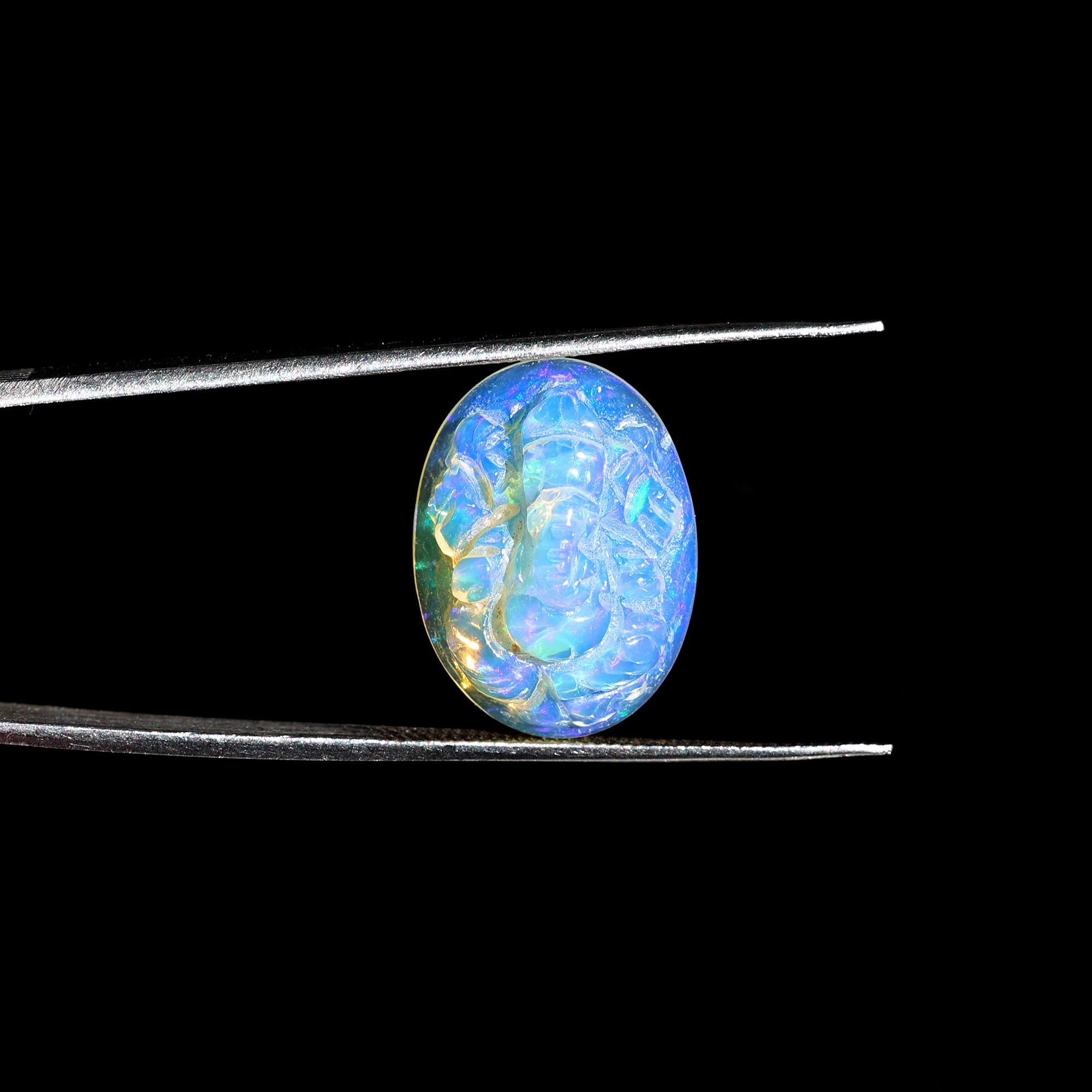 8.60 Carat Carved White Ethiopian Opal Ganesha Figurine