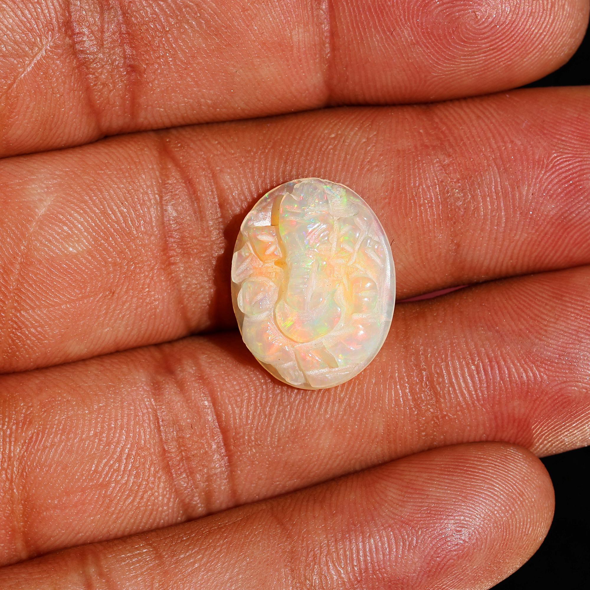 Hand-Carved Ethiopian Opal Ganesha Statue: Spiritual Home Decor (15x19mm, 7.50 Carat) loose gemstones