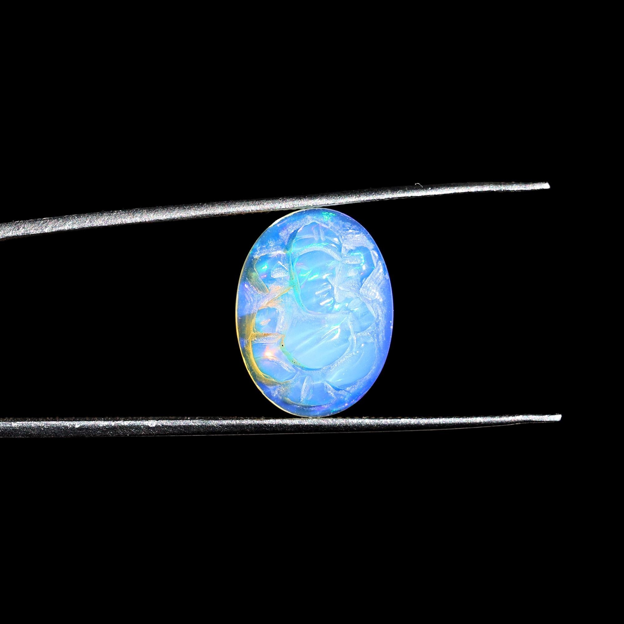 Ethiopian Opal Ganesha Carving: Divine Gemstone (12x16mm)