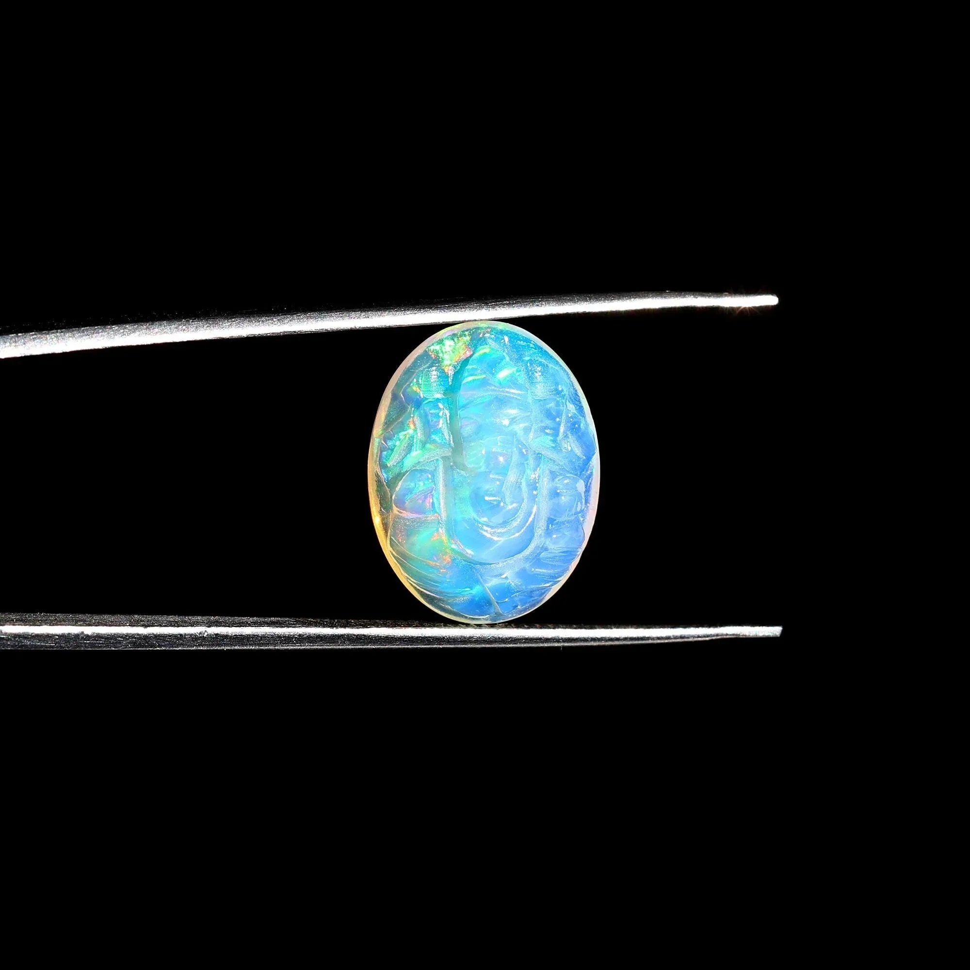 5.10 Carat Carved Ethiopian Opal Ganesha Gemstone (12x16mm) loose gemstones